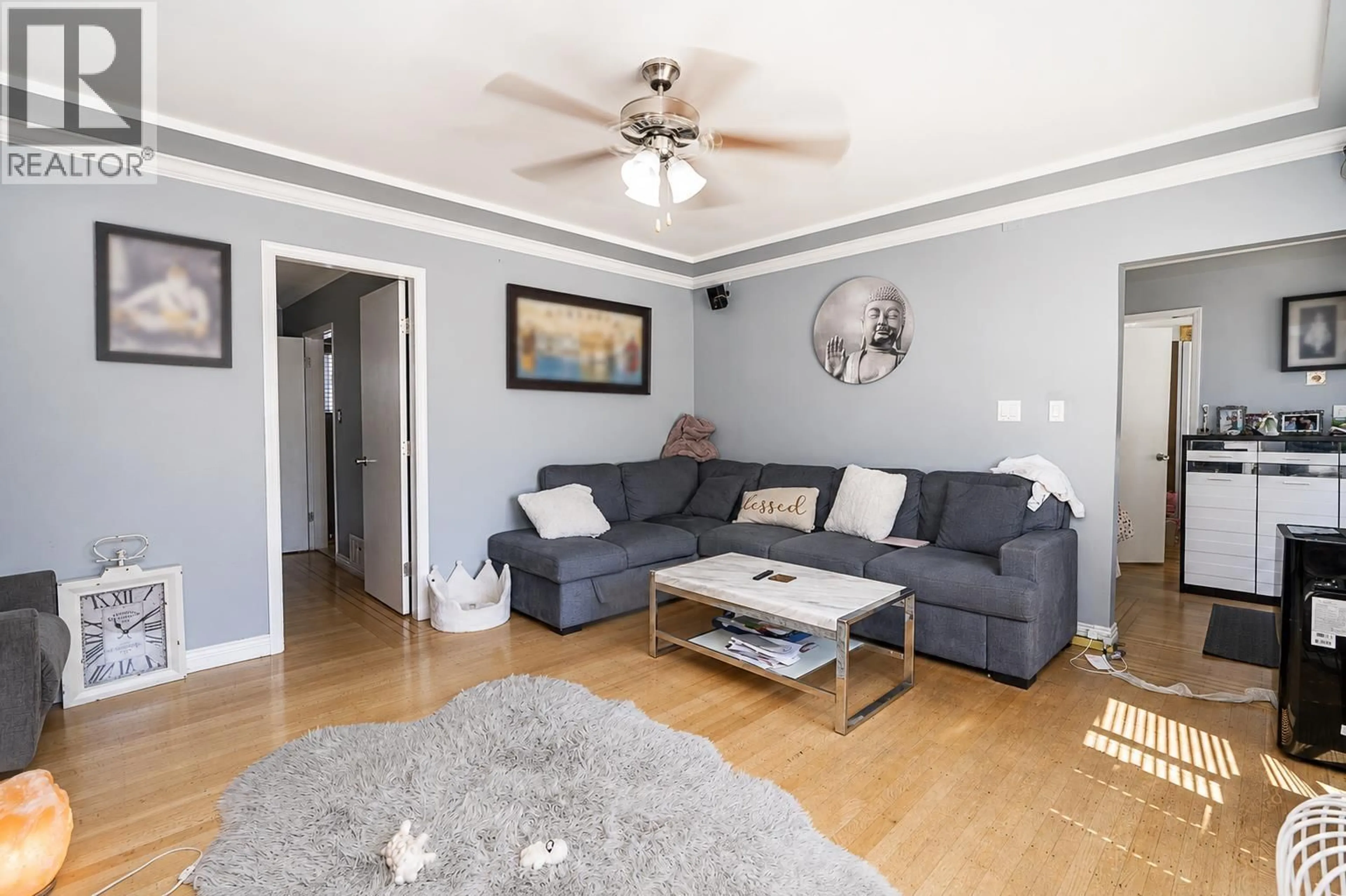 Living room with furniture, wood/laminate floor for 2873 54TH AVENUE, Vancouver British Columbia V5S1Y4