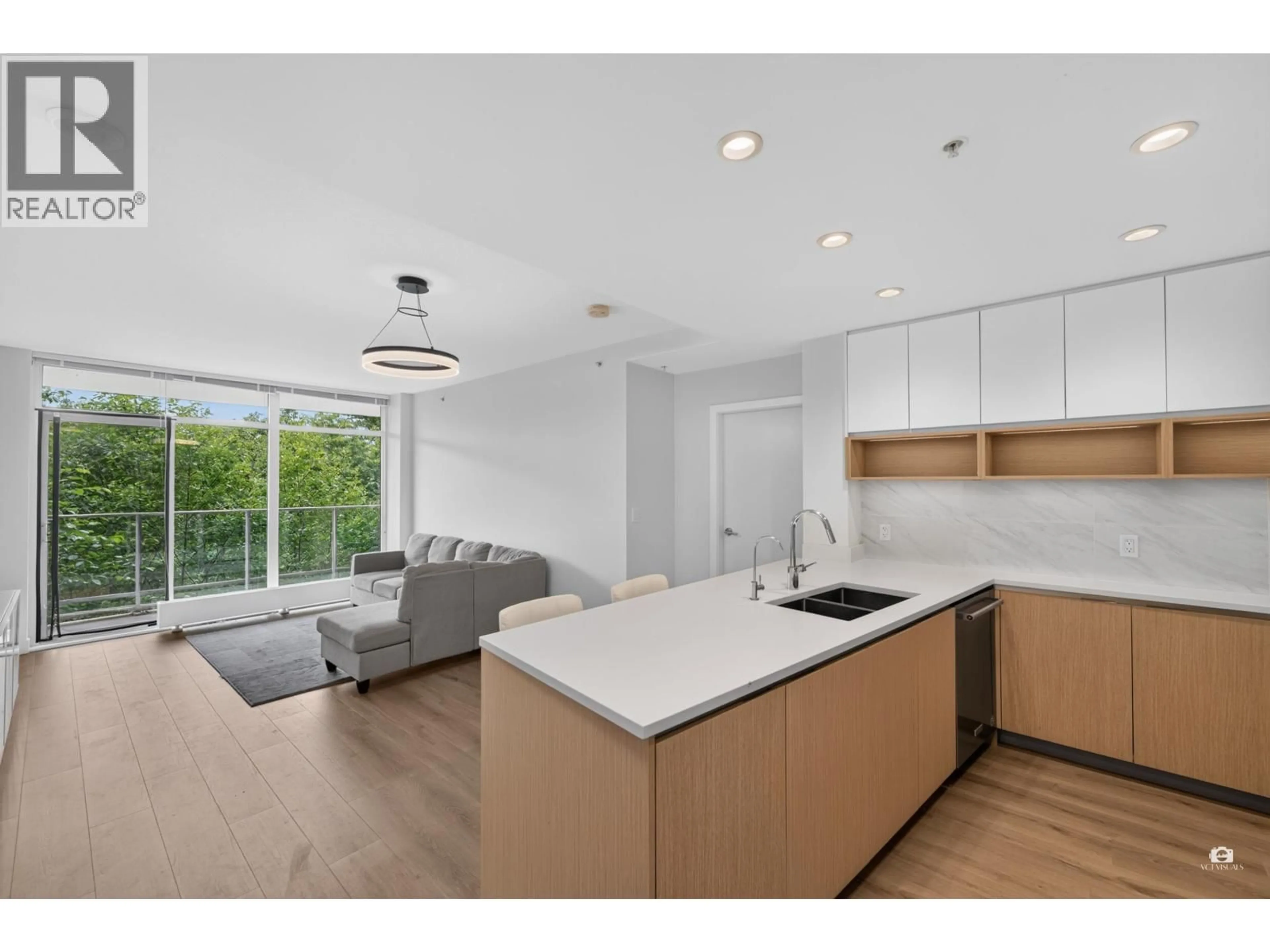Open concept kitchen, unknown for 105 - 8940 UNIVERSITY CRESCENT, Burnaby British Columbia V5A0E7