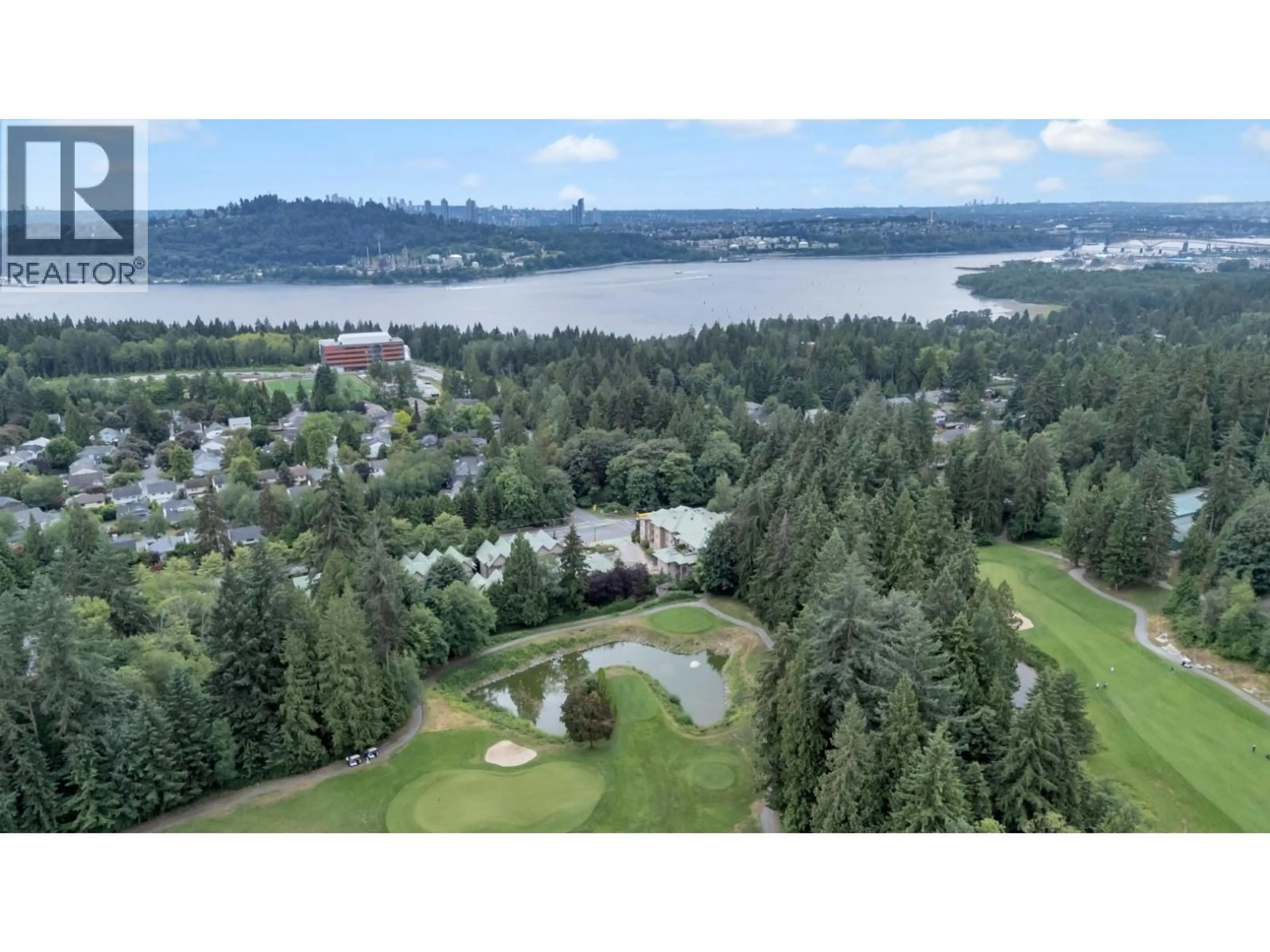 A pic from outside/outdoor area/front of a property/back of a property/a pic from drone, water/lake/river/ocean view for 105 - 3294 MT SEYMOUR PARKWAY, North Vancouver British Columbia V7H0B1
