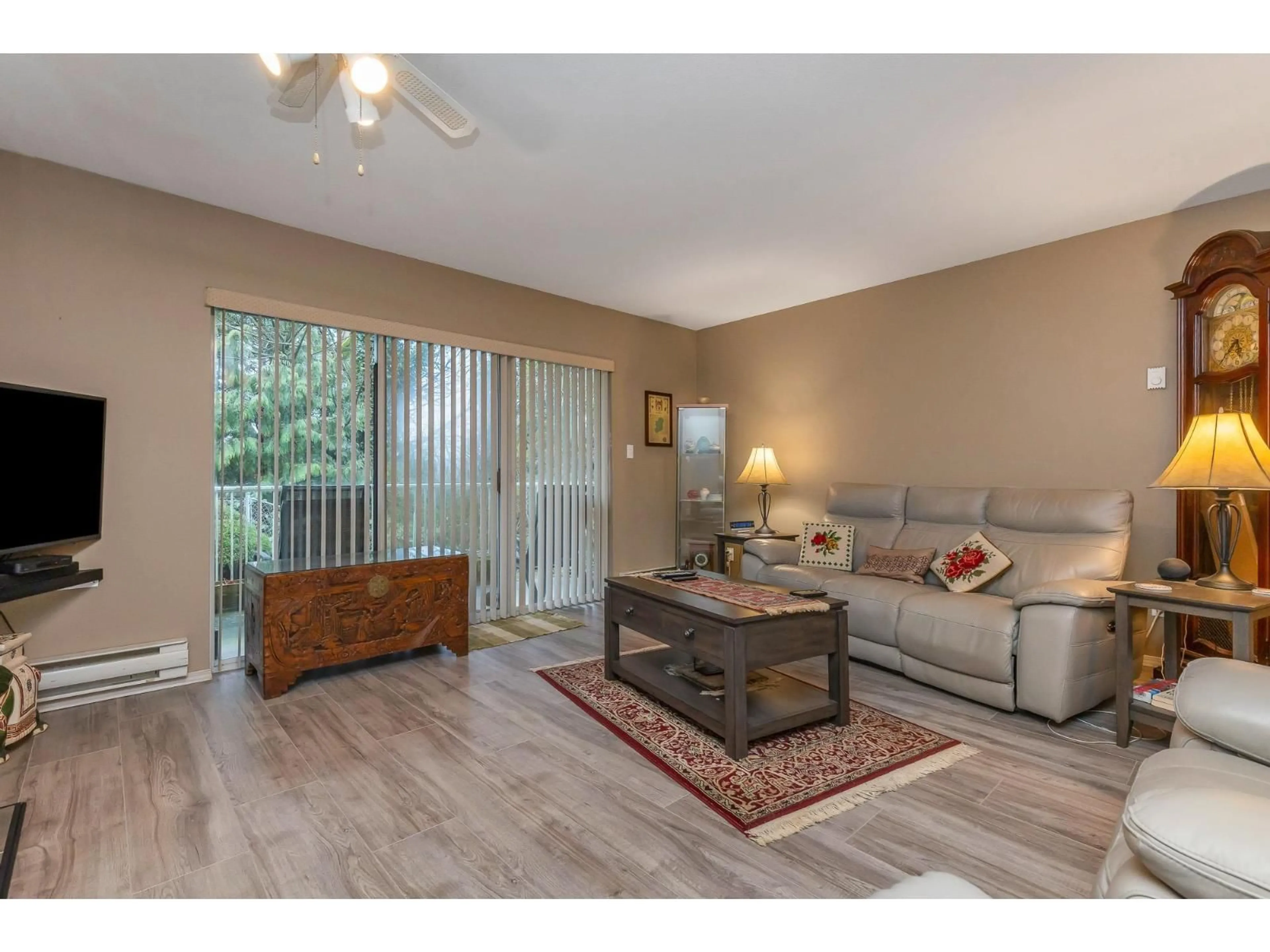 Living room with furniture, wood/laminate floor for 47 - 3380 GLADWIN ROAD, Abbotsford British Columbia V2S7G1