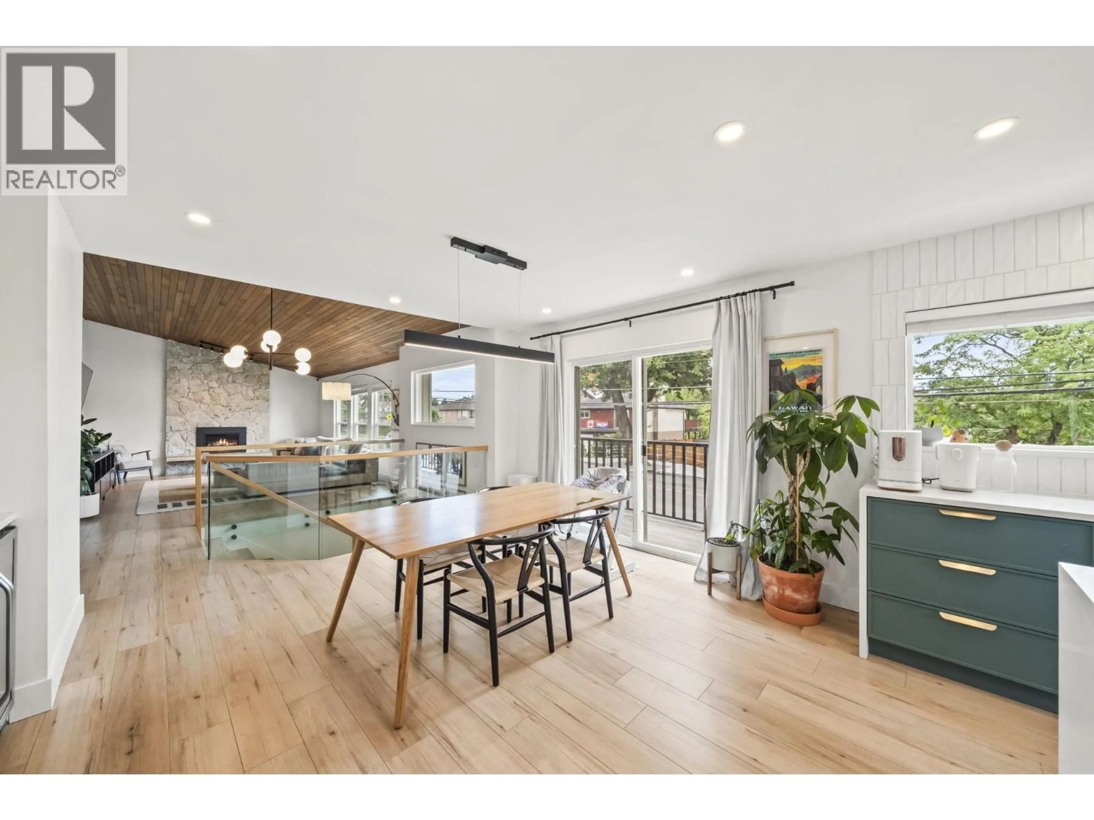 Open concept kitchen, wood/laminate floor for 7658 CUMBERLAND STREET, Burnaby British Columbia V3N3X8