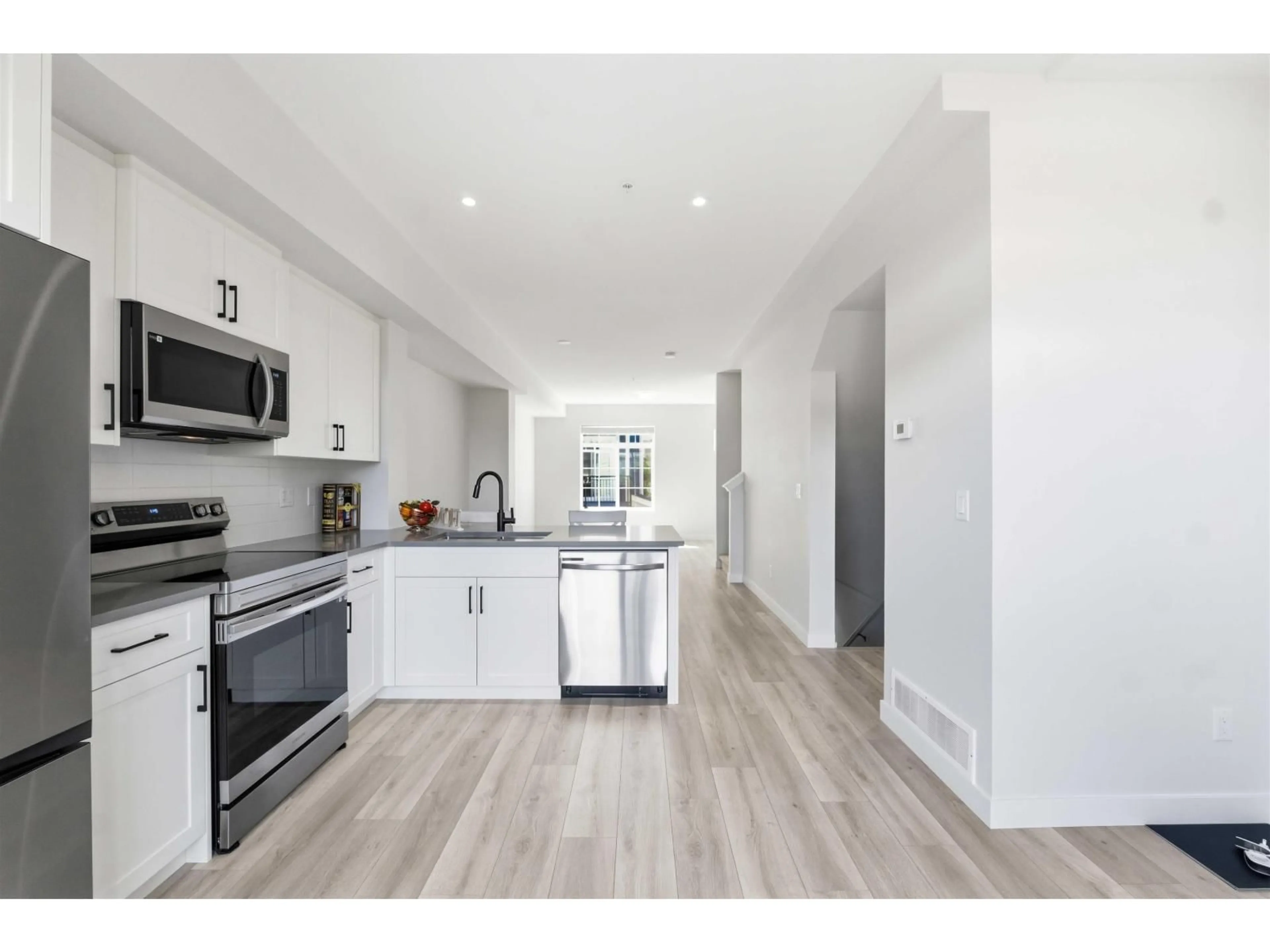 Open concept kitchen, unknown for 143 - 20180 84 AVENUE, Langley British Columbia V2Y3N5