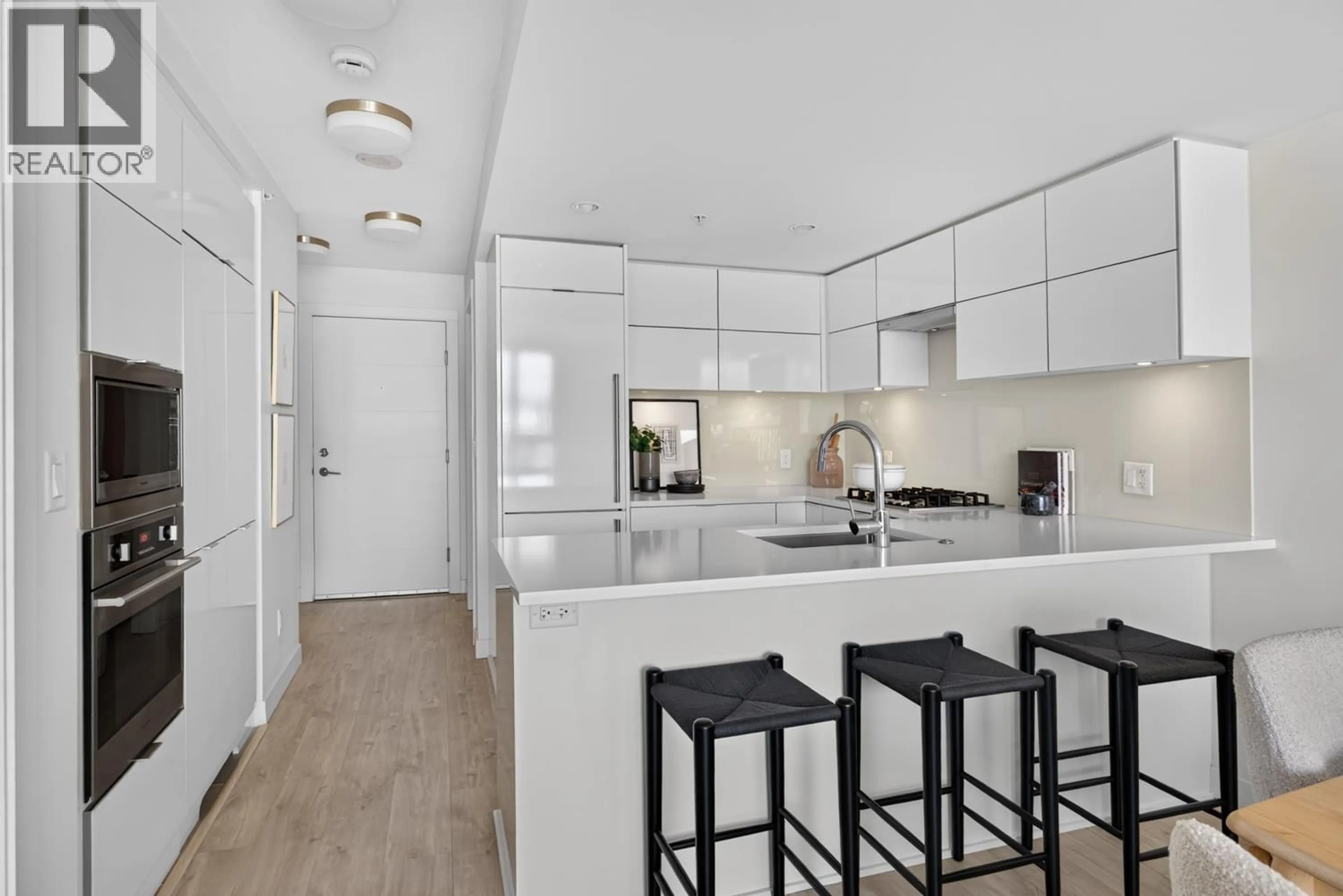 Open concept kitchen, ceramic/tile floor for 707 - 238 BROADWAY, Vancouver British Columbia V5Y0L2