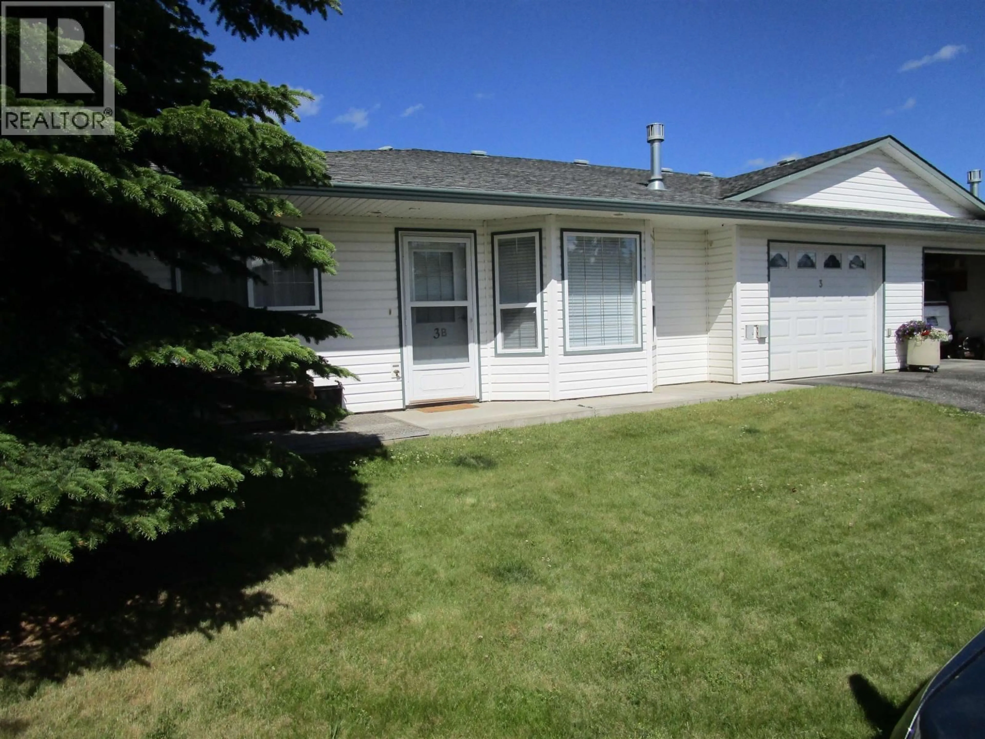 Home with vinyl exterior material, street for 3B - 814 CARIBOO TRAIL, 100 Mile House British Columbia V0K2E0