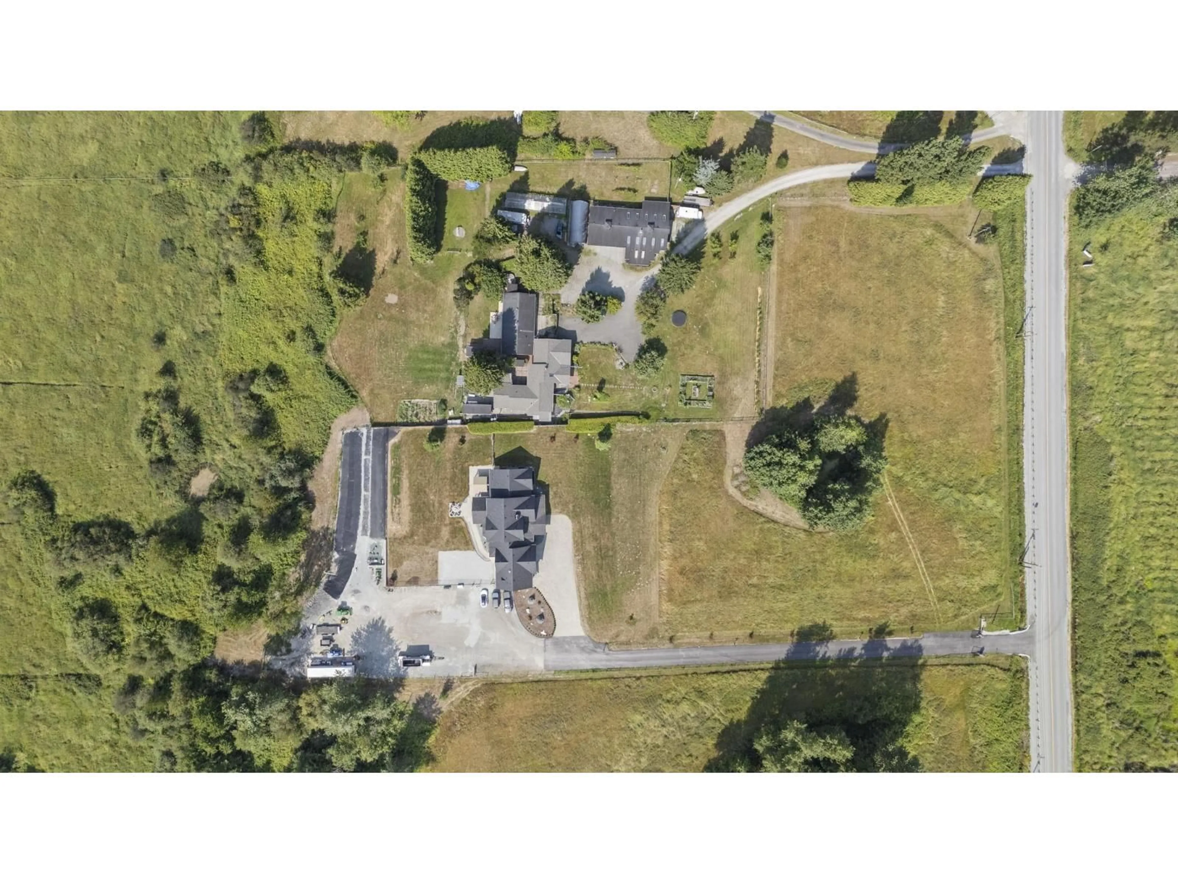 A pic from outside/outdoor area/front of a property/back of a property/a pic from drone, street for 20720 102B AVENUE, Langley British Columbia V1M3H2