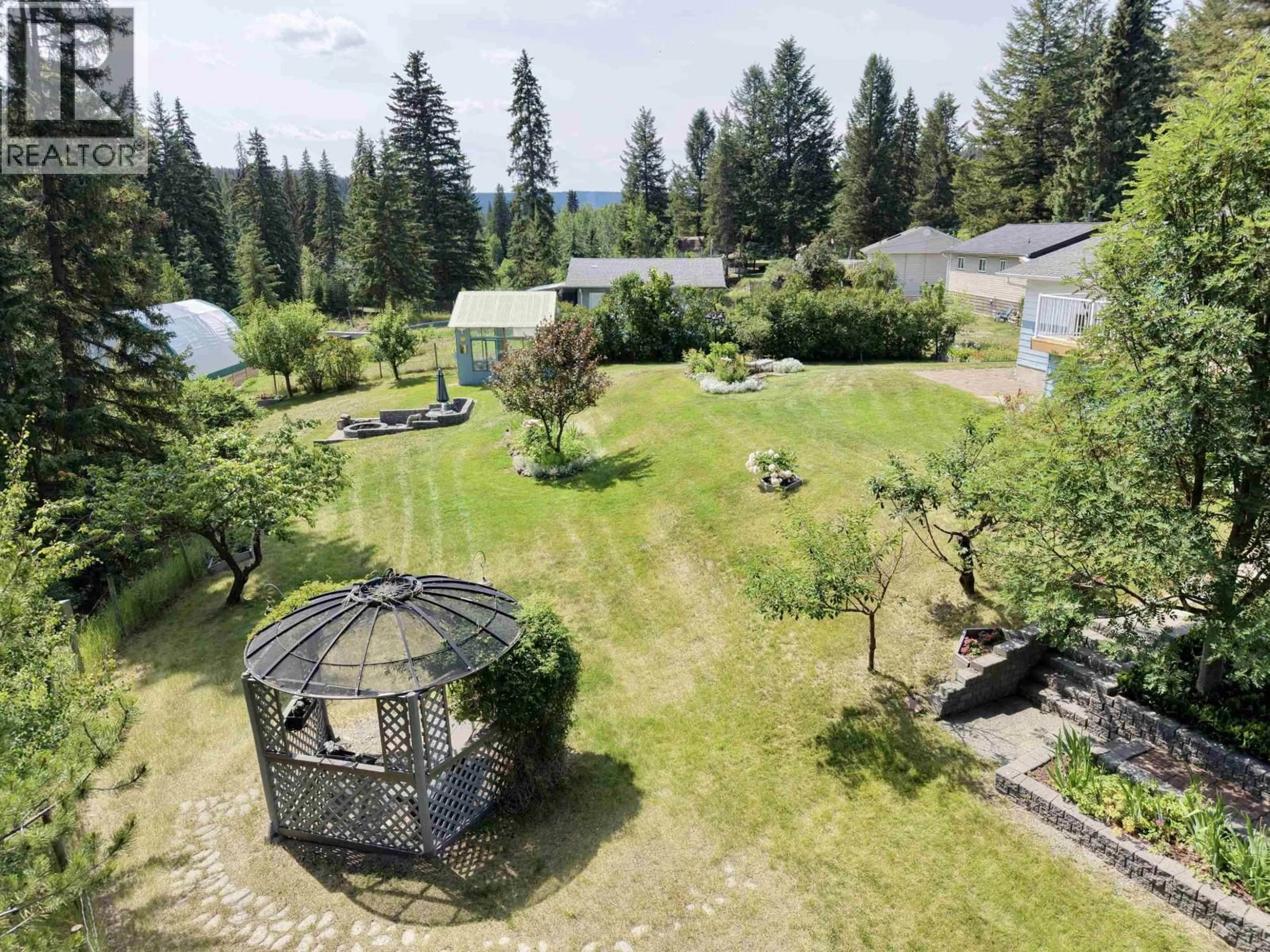 A pic from outside/outdoor area/front of a property/back of a property/a pic from drone, mountain view for 5451 KENNEDY ROAD, 100 Mile House British Columbia V0K2E3