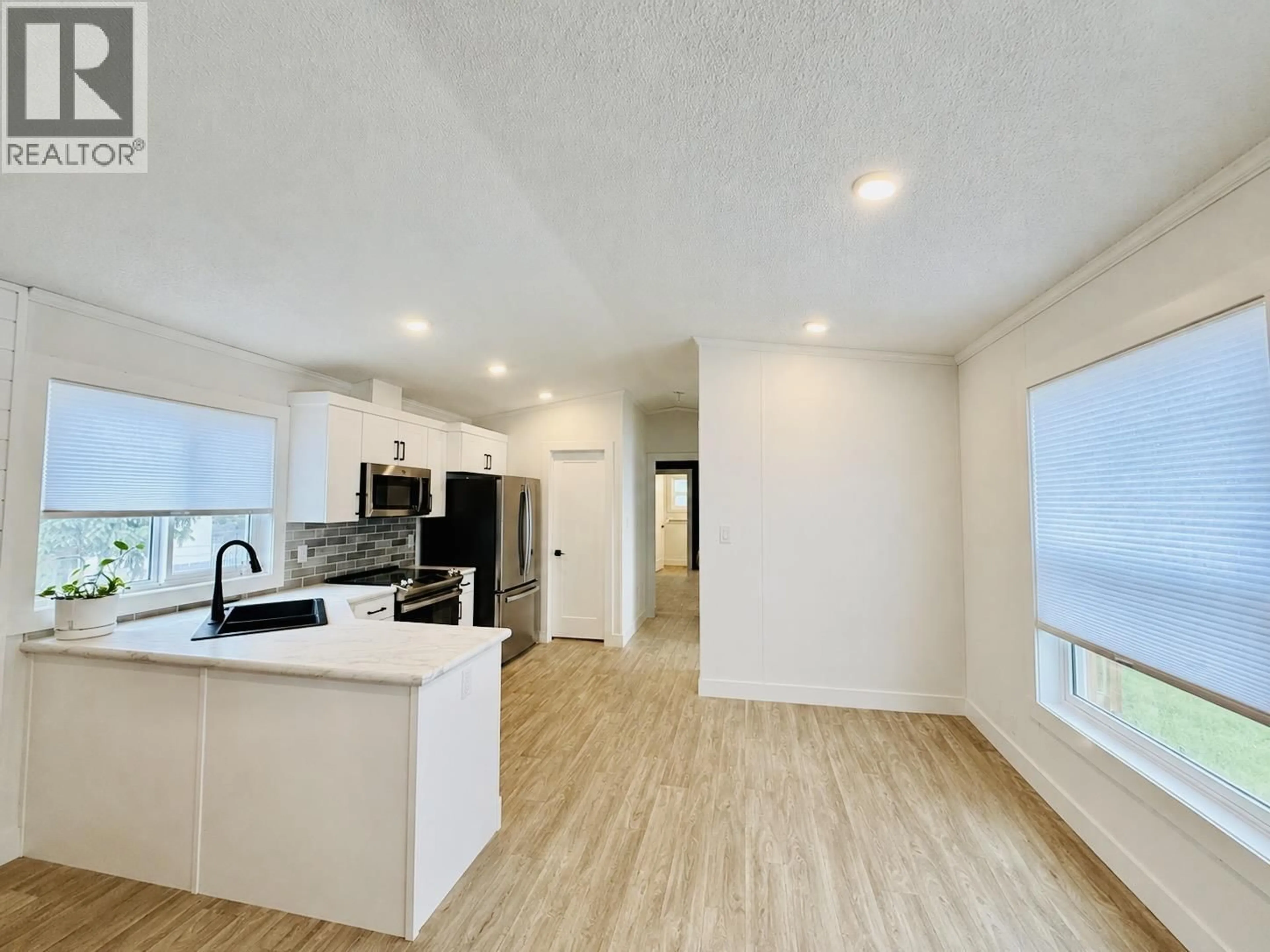 Open concept kitchen, unknown for 89 - 95 LAIDLAW ROAD, Smithers British Columbia V0J2N6