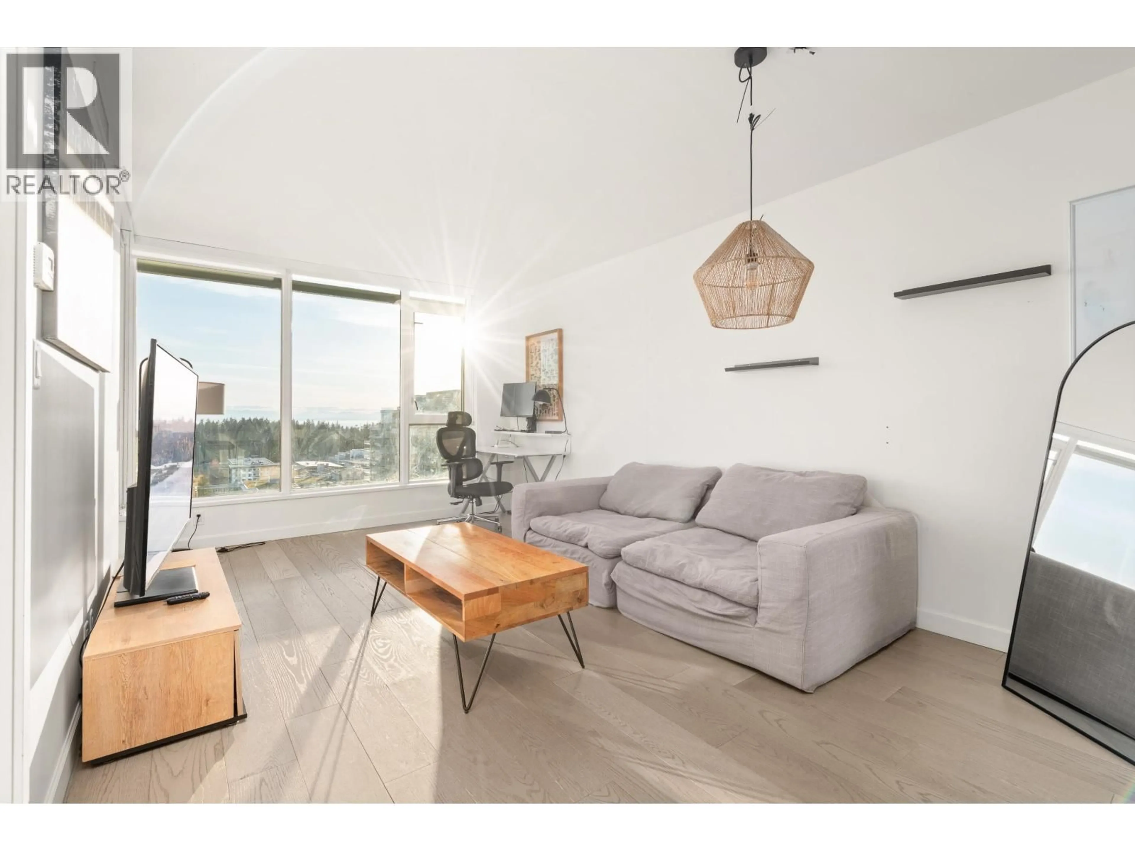 Living room with furniture, wood/laminate floor for 2110 - 3355 BINNING ROAD, Vancouver British Columbia V6S0J1