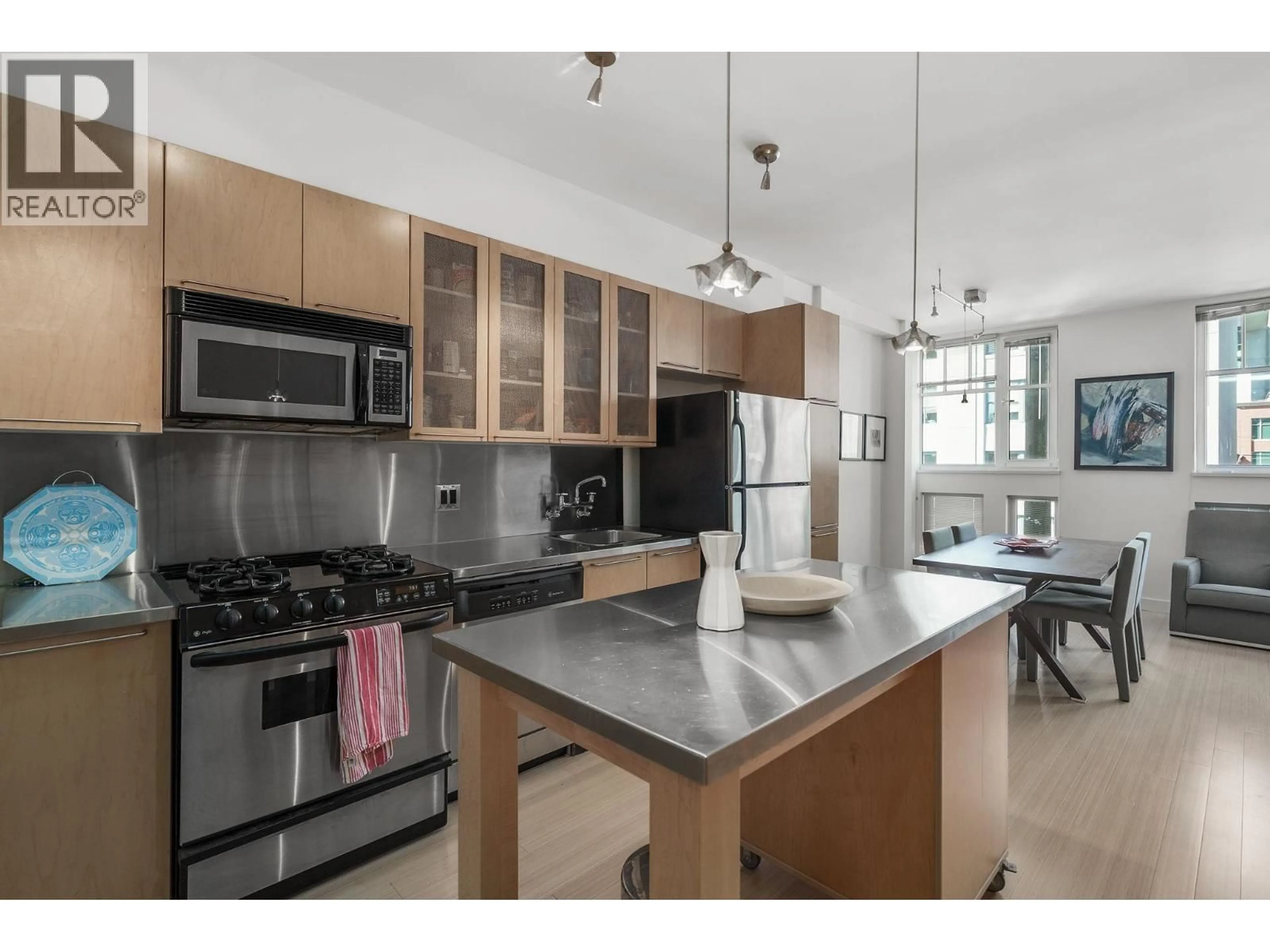 Open concept kitchen, unknown for 402 - 1072 HAMILTON STREET, Vancouver British Columbia V6B2R9