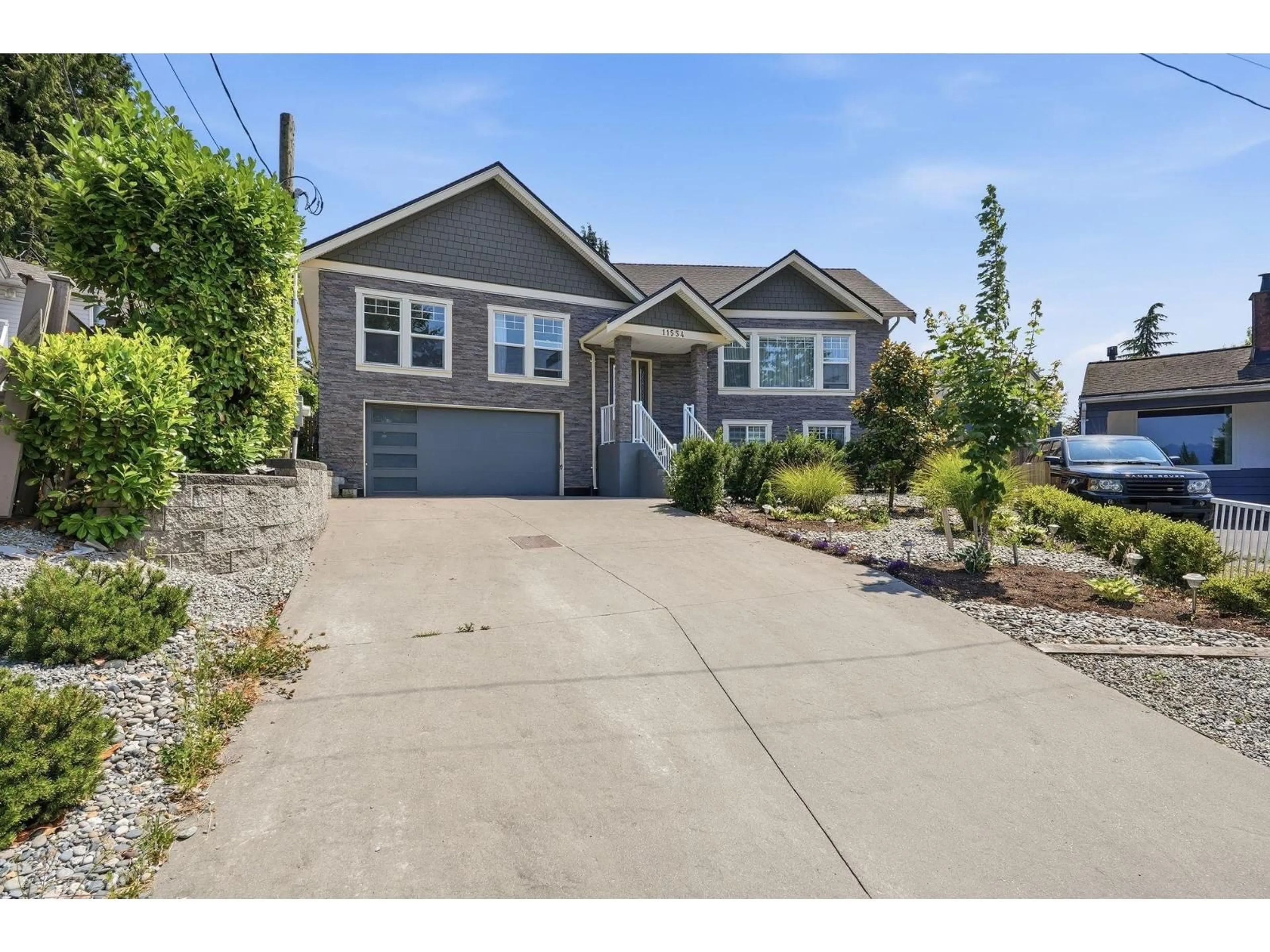 Home with vinyl exterior material, street for 11554 92A AVENUE, Delta British Columbia V4C3M7