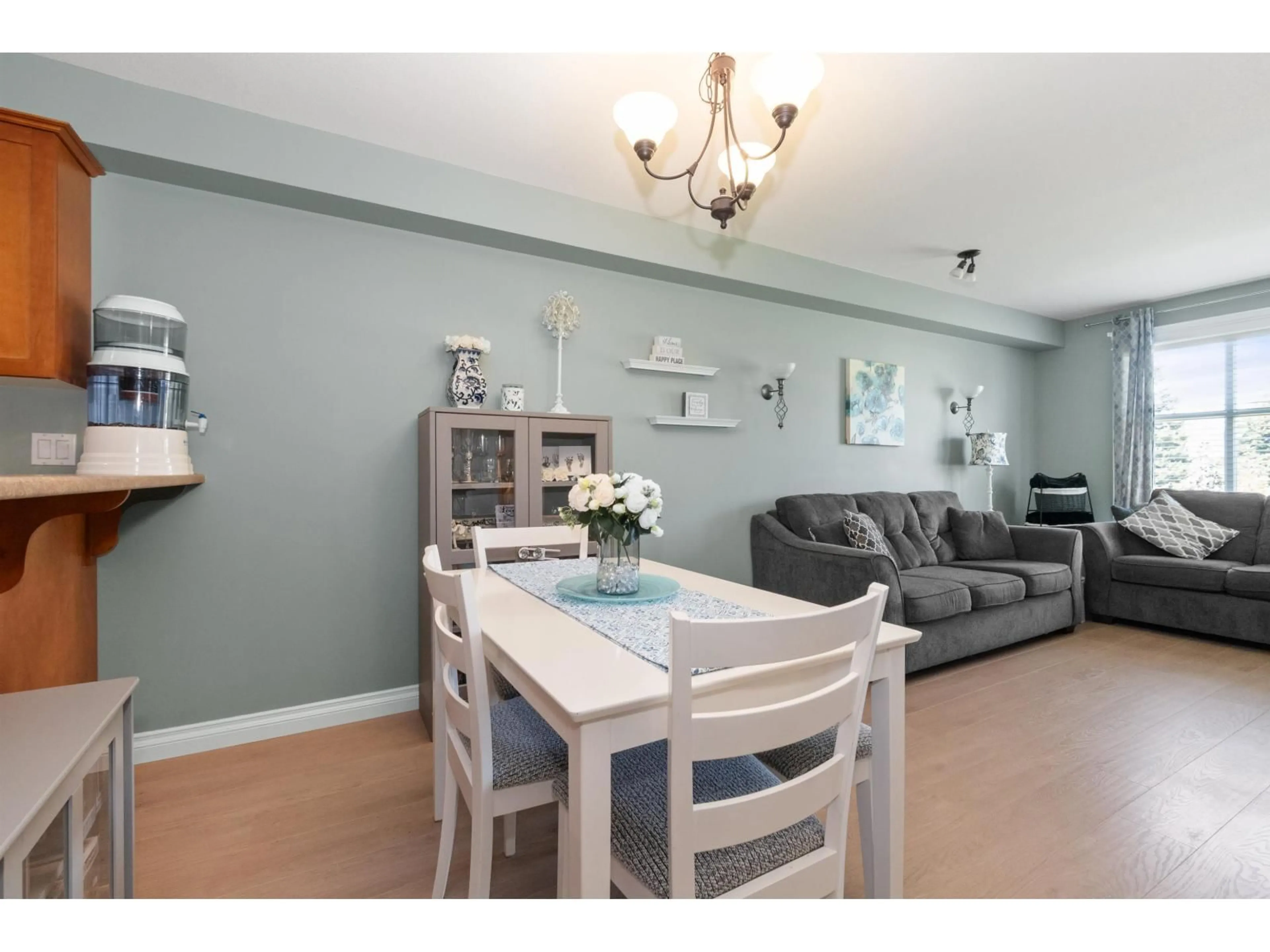 Living room with furniture, wood/laminate floor for 309 - 8955 EDWARD STREET, Chilliwack British Columbia V2P4E2