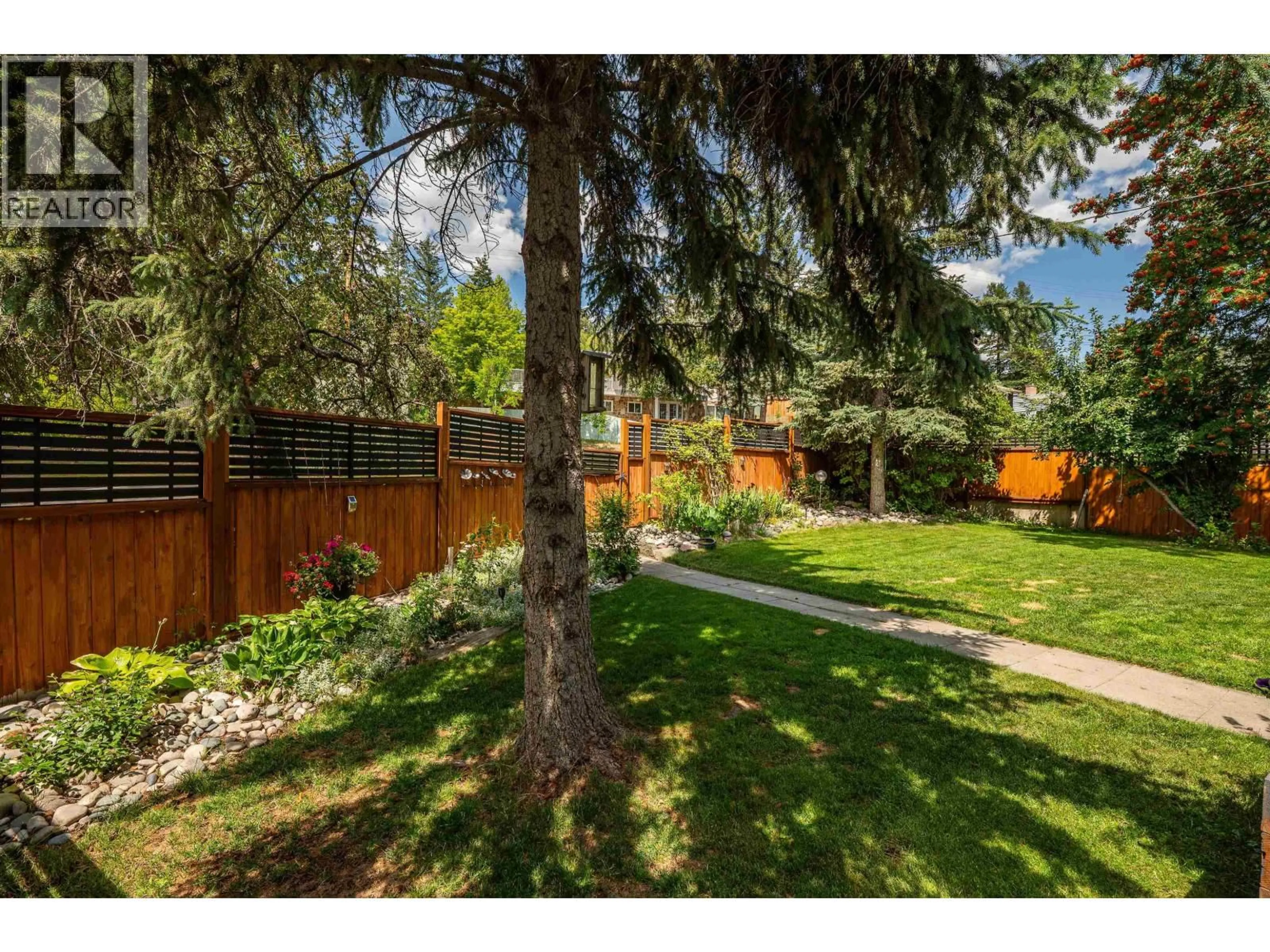 A pic from outside/outdoor area/front of a property/back of a property/a pic from drone, forest/trees view for 603 GIBBON STREET, Williams Lake British Columbia V2G1V6