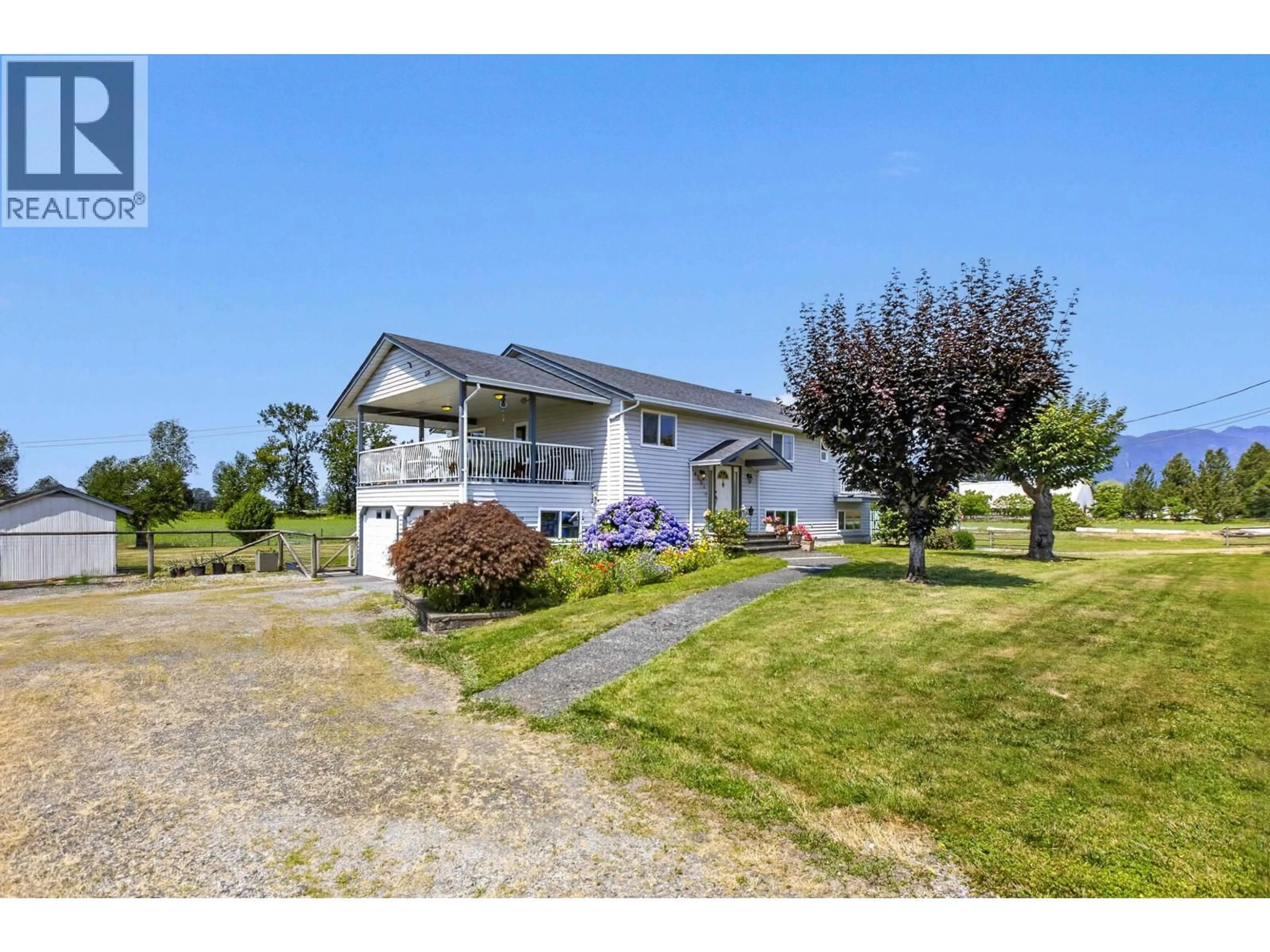 A pic from outside/outdoor area/front of a property/back of a property/a pic from drone, street for 14221 MCKECHNIE ROAD, Pitt Meadows British Columbia V3Y1Z1