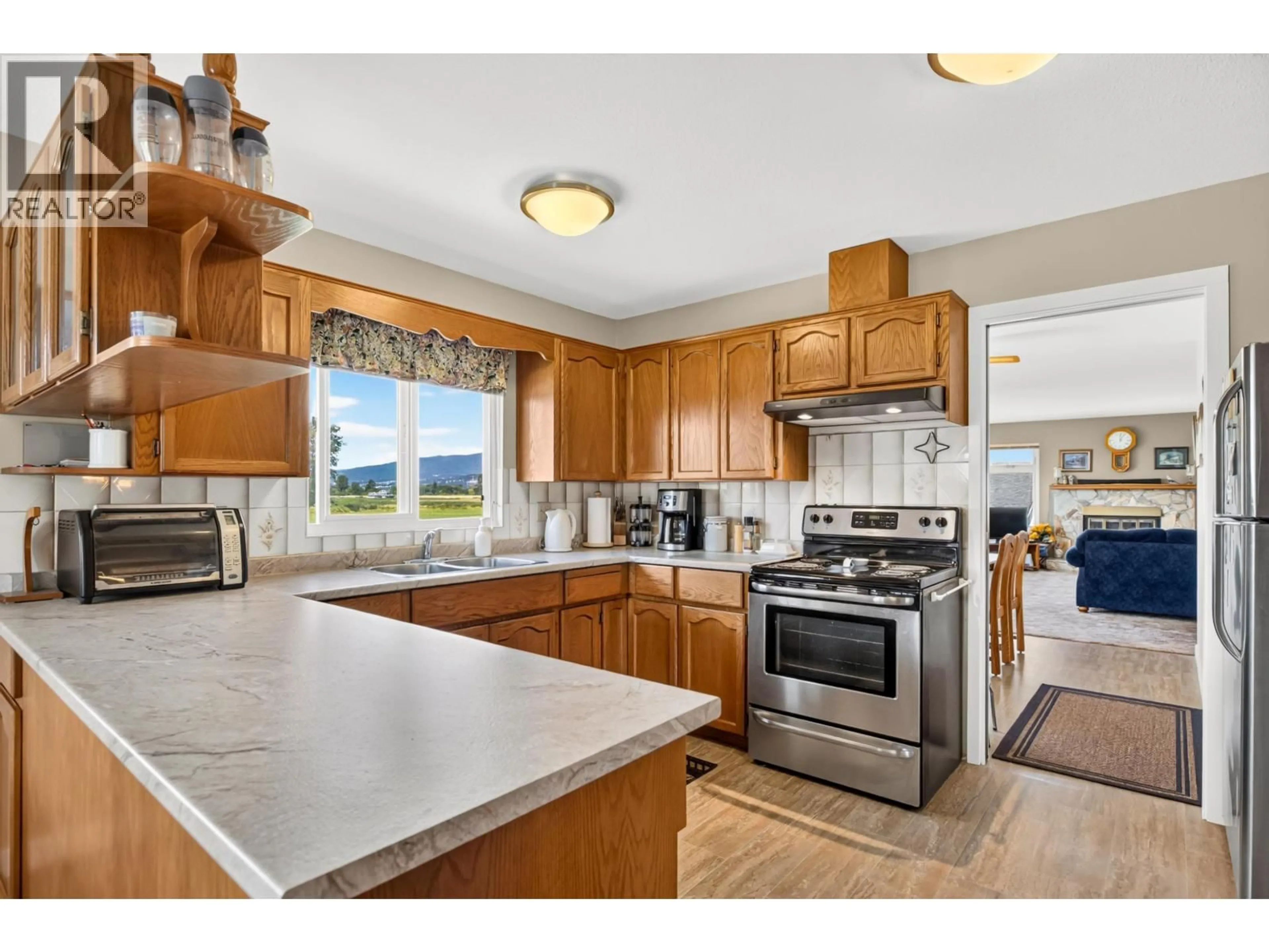 Open concept kitchen, ceramic/tile floor for 14221 MCKECHNIE ROAD, Pitt Meadows British Columbia V3Y1Z1