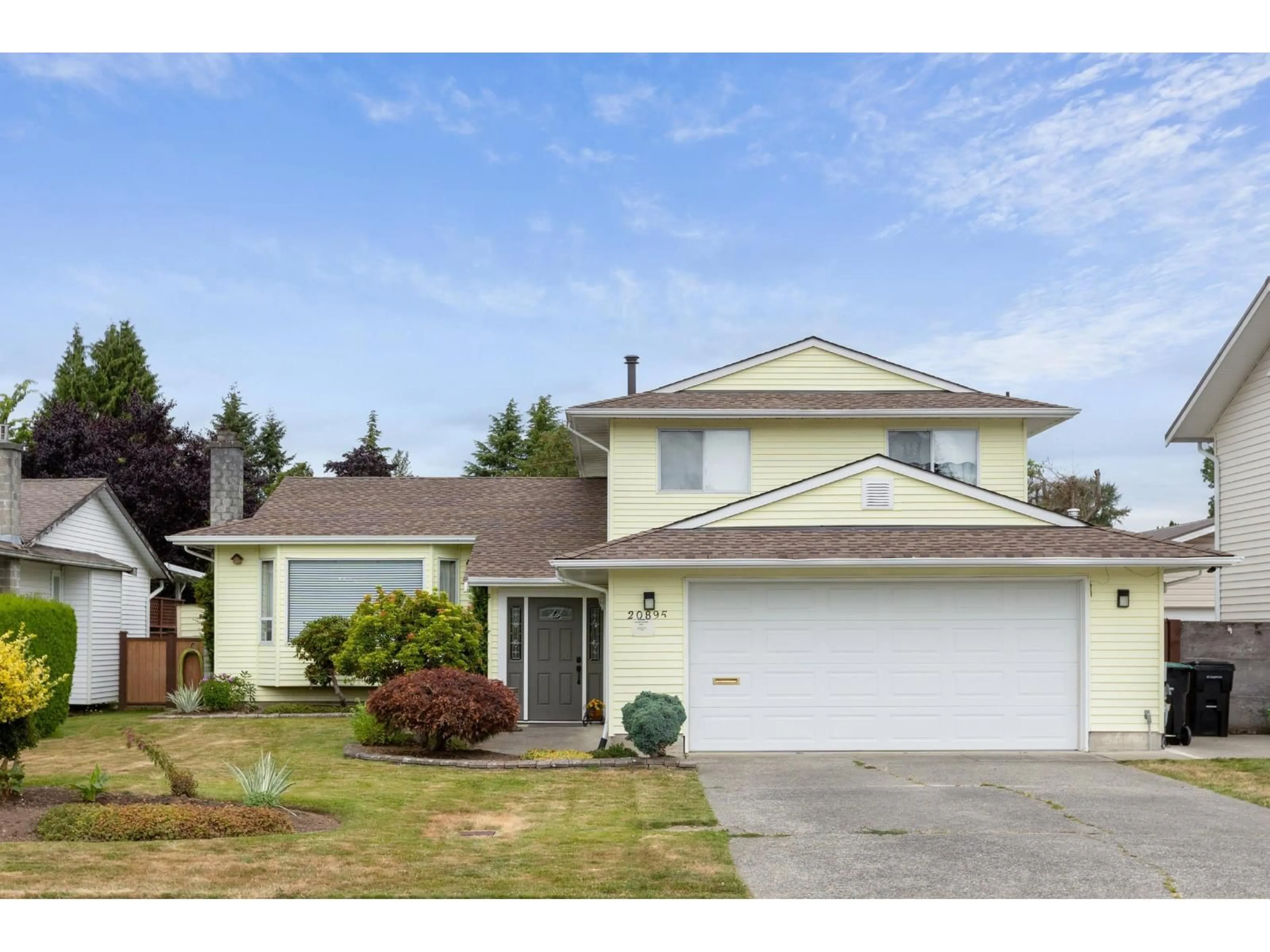 Home with vinyl exterior material, street for 20895 51B AVENUE, Langley British Columbia V3A7K6