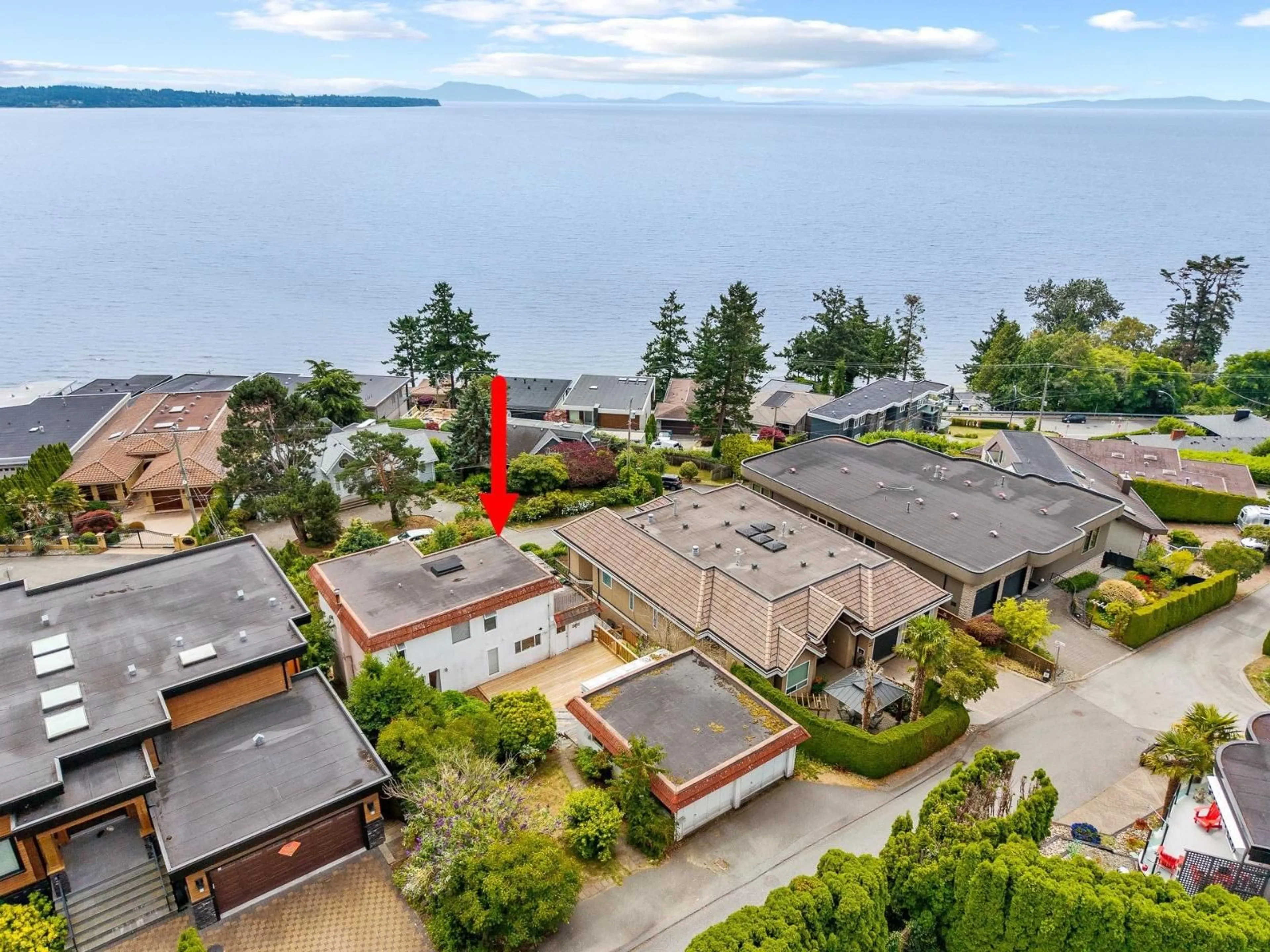 A pic from outside/outdoor area/front of a property/back of a property/a pic from drone, water/lake/river/ocean view for 14471 MAGDALEN CRESCENT, White Rock British Columbia V4B2W1