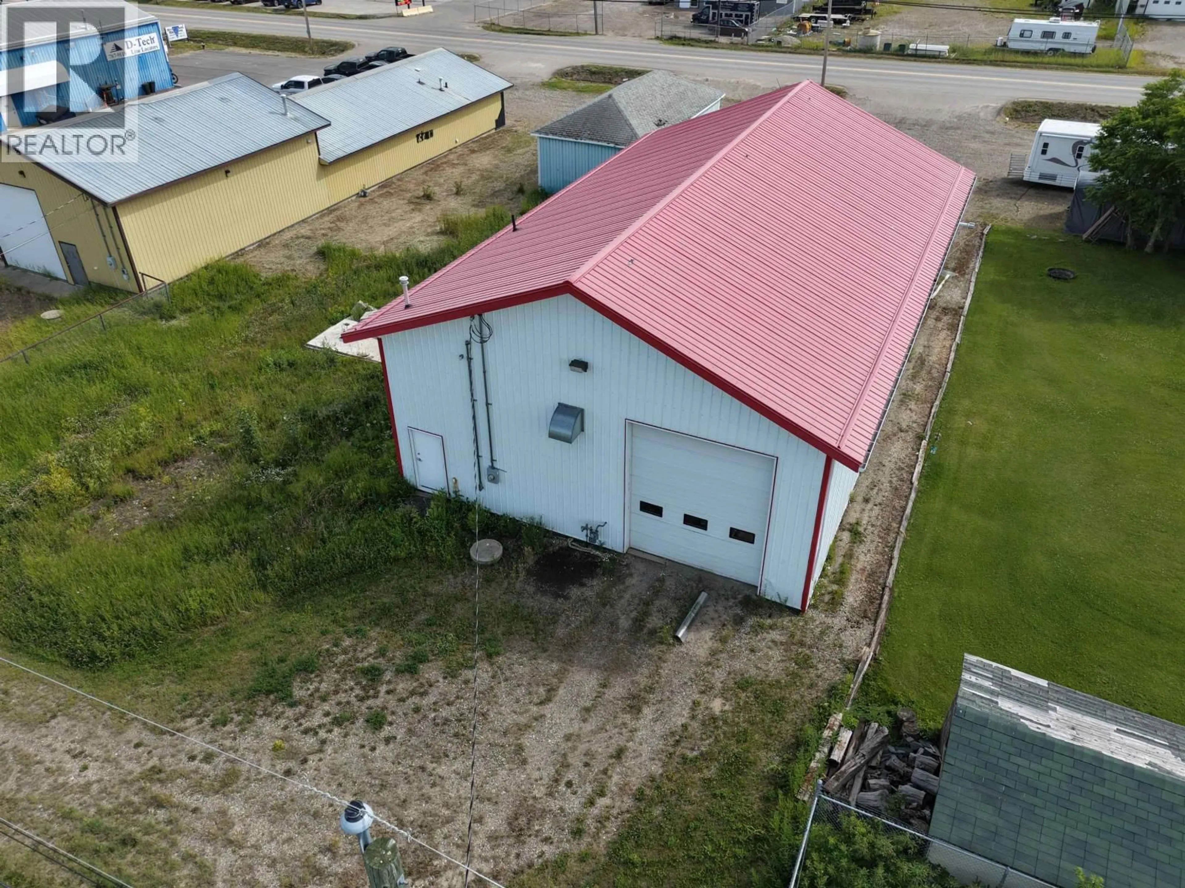 A pic from outside/outdoor area/front of a property/back of a property/a pic from drone, building for 8354 100 AVENUE, Fort St. John British Columbia V1J1W6
