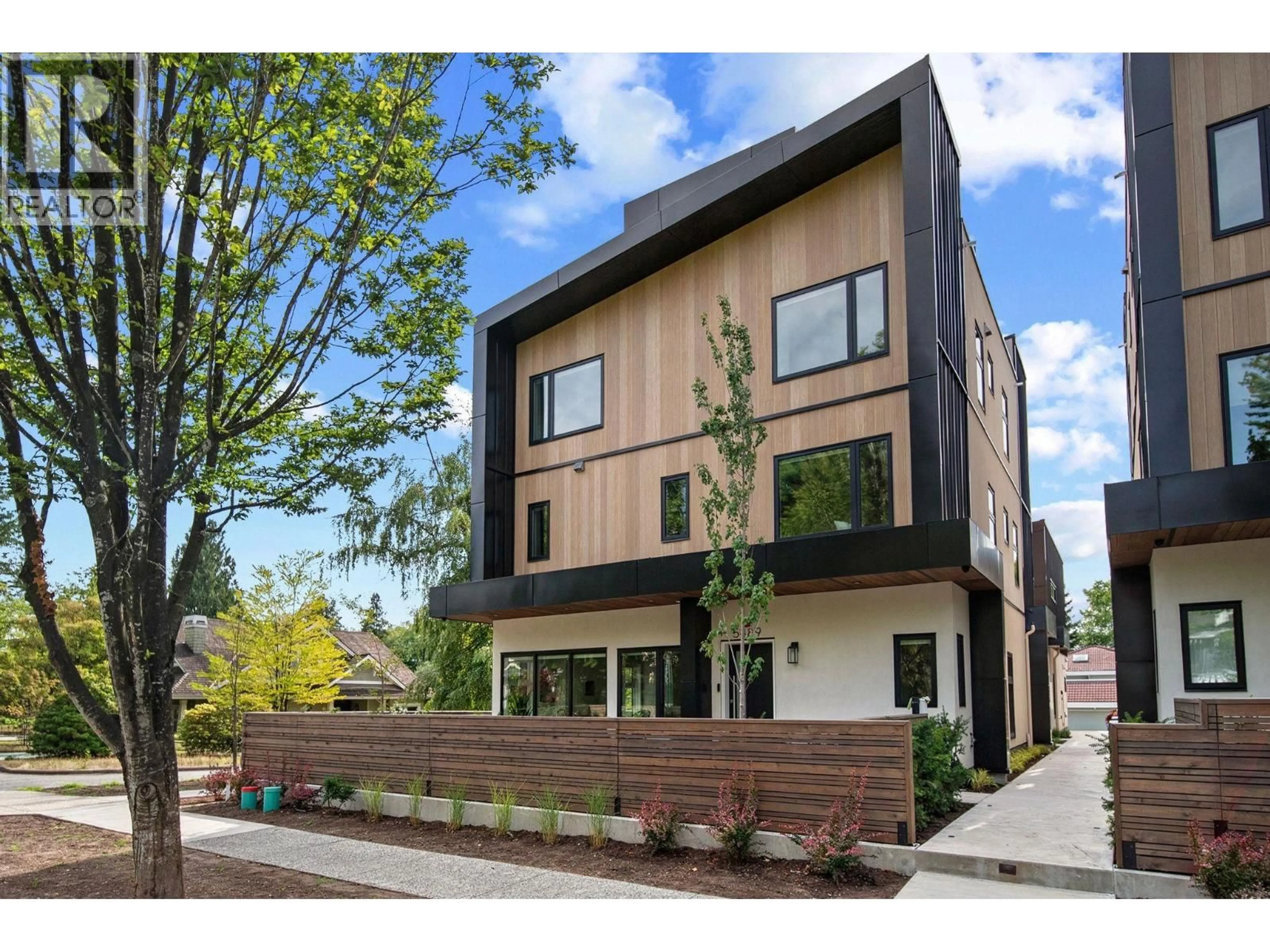 Home with brick exterior material, street for 5489 LARCH STREET, Vancouver British Columbia V6M4C7