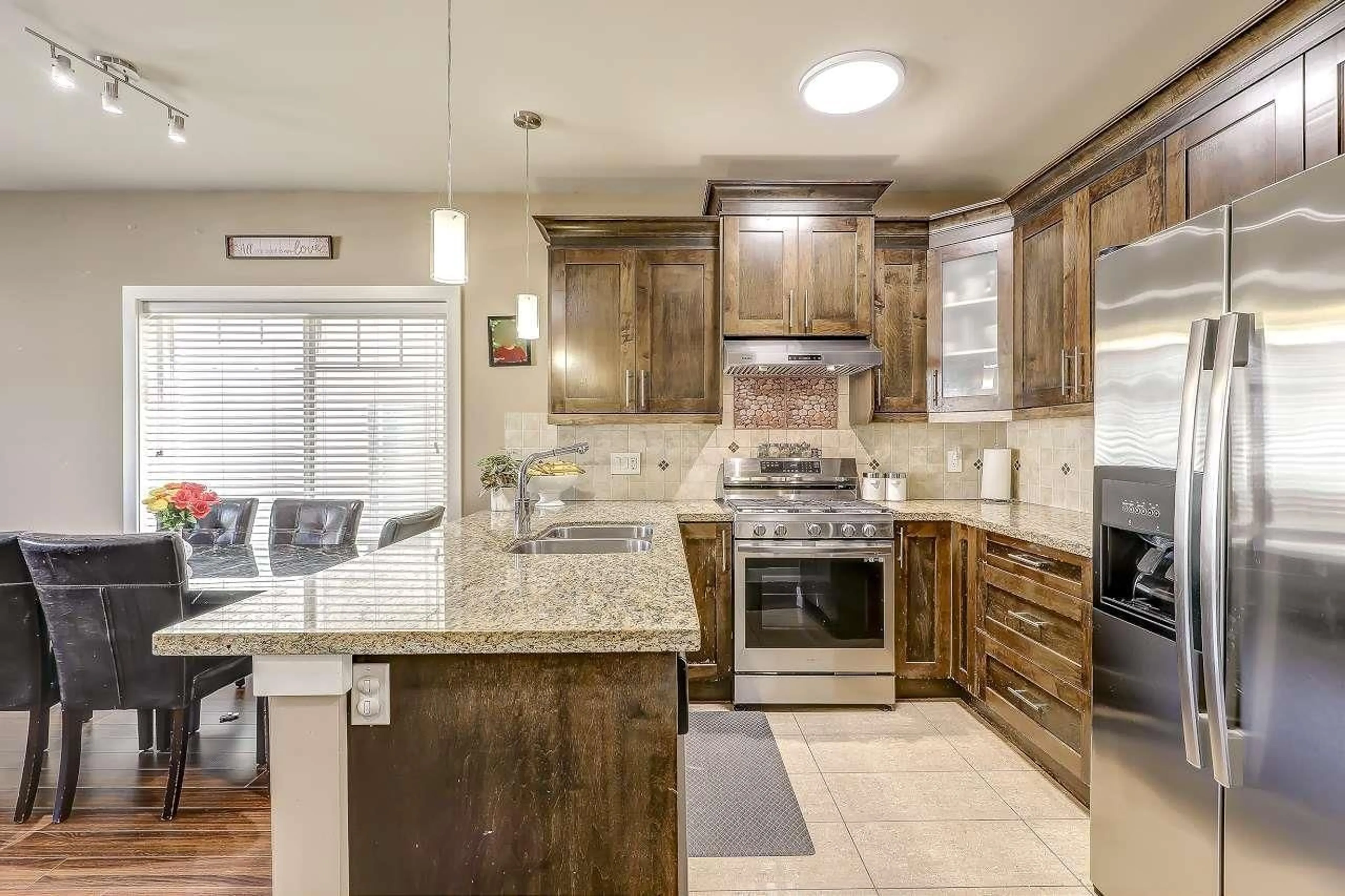 Open concept kitchen, ceramic/tile floor for 13987 64 AVENUE, Surrey British Columbia V3W1Y7