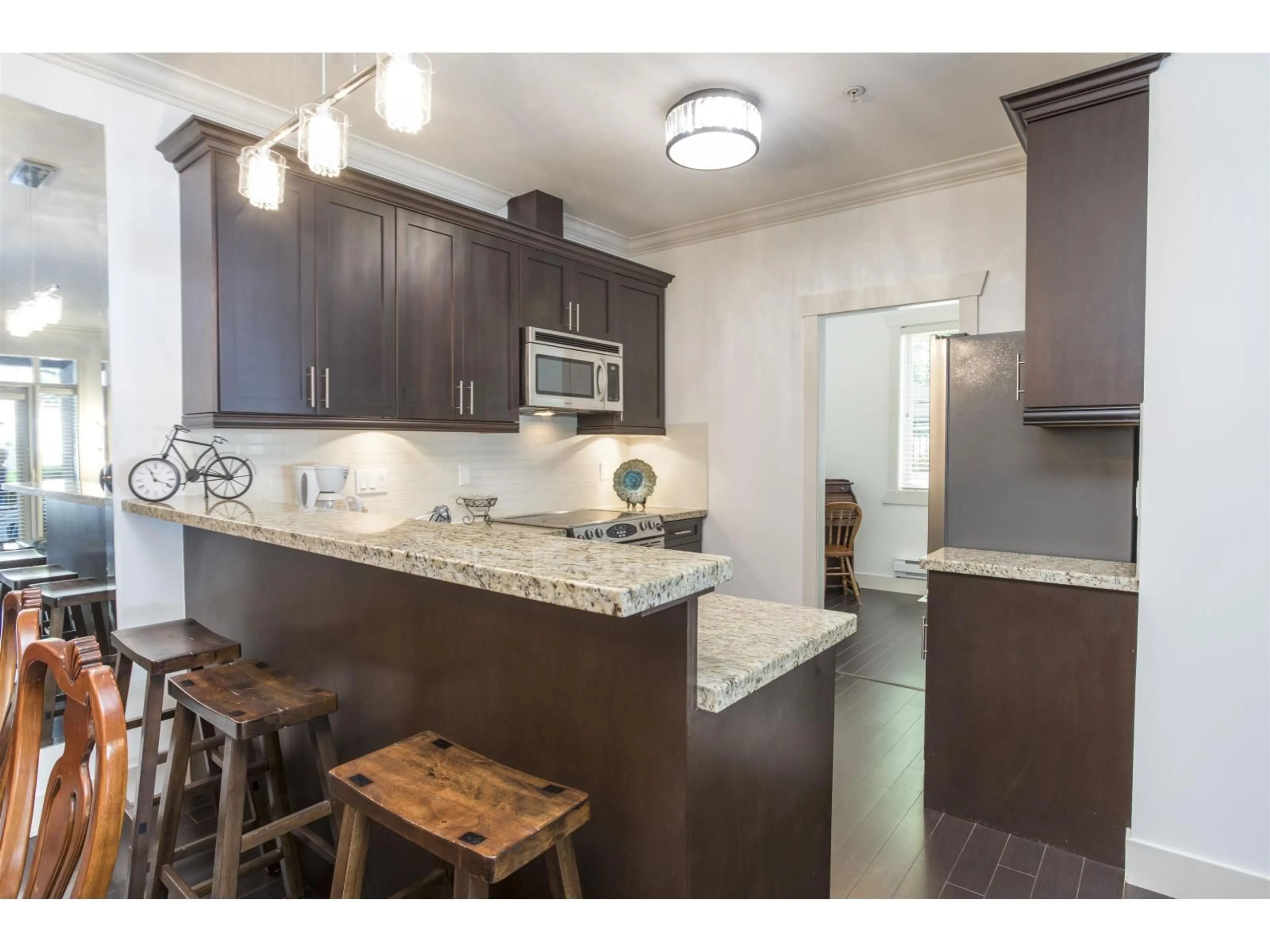 Open concept kitchen, unknown for 102 - 15368 17A AVENUE, Surrey British Columbia V4A1V3