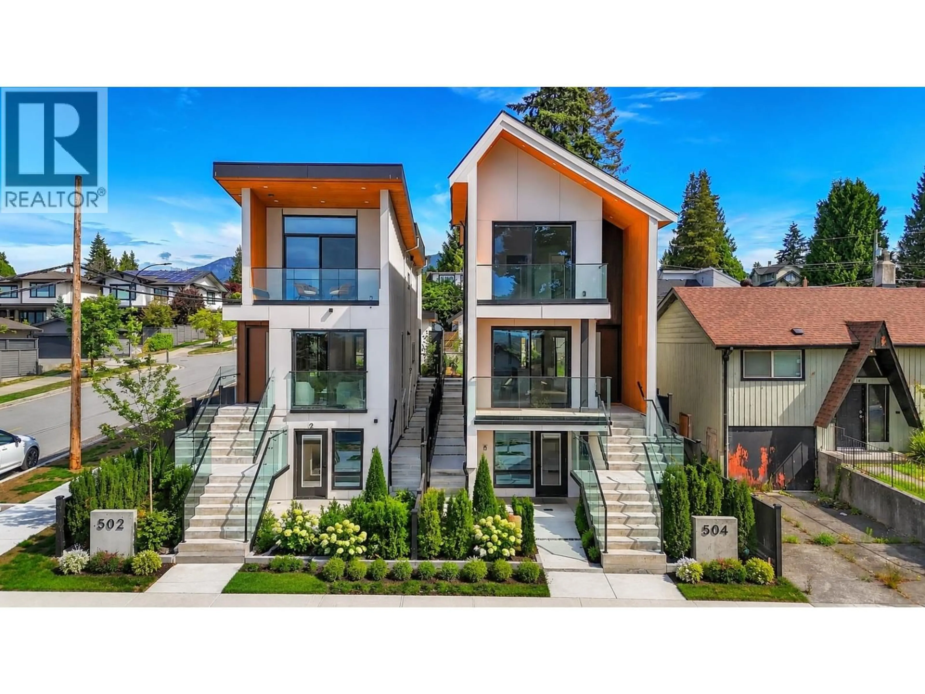 Home with vinyl exterior material, street for 502 5TH STREET, North Vancouver British Columbia V7L1M4