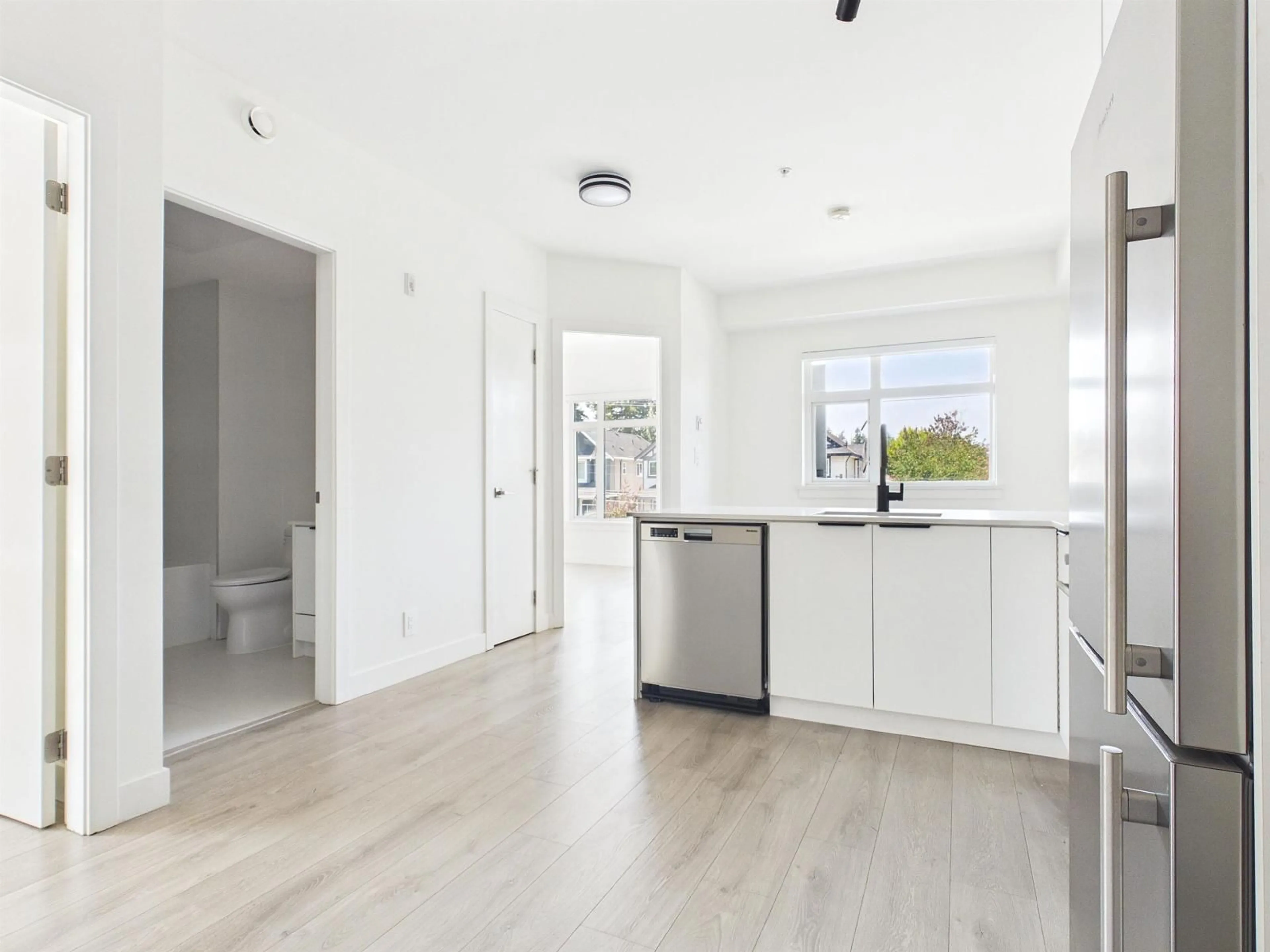Open concept kitchen, unknown for 303 - 10616 132 STREET, Surrey British Columbia V3T0T3