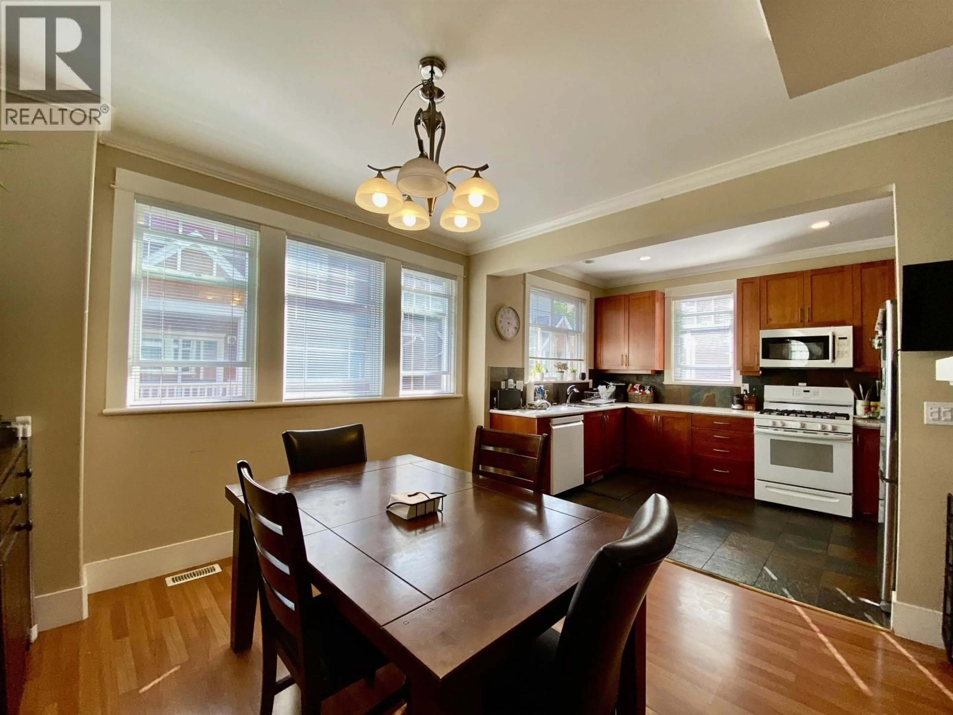 Open concept kitchen, wood/laminate floor for 25 - 6431 PRINCESS LANE, Richmond British Columbia V7E6T3