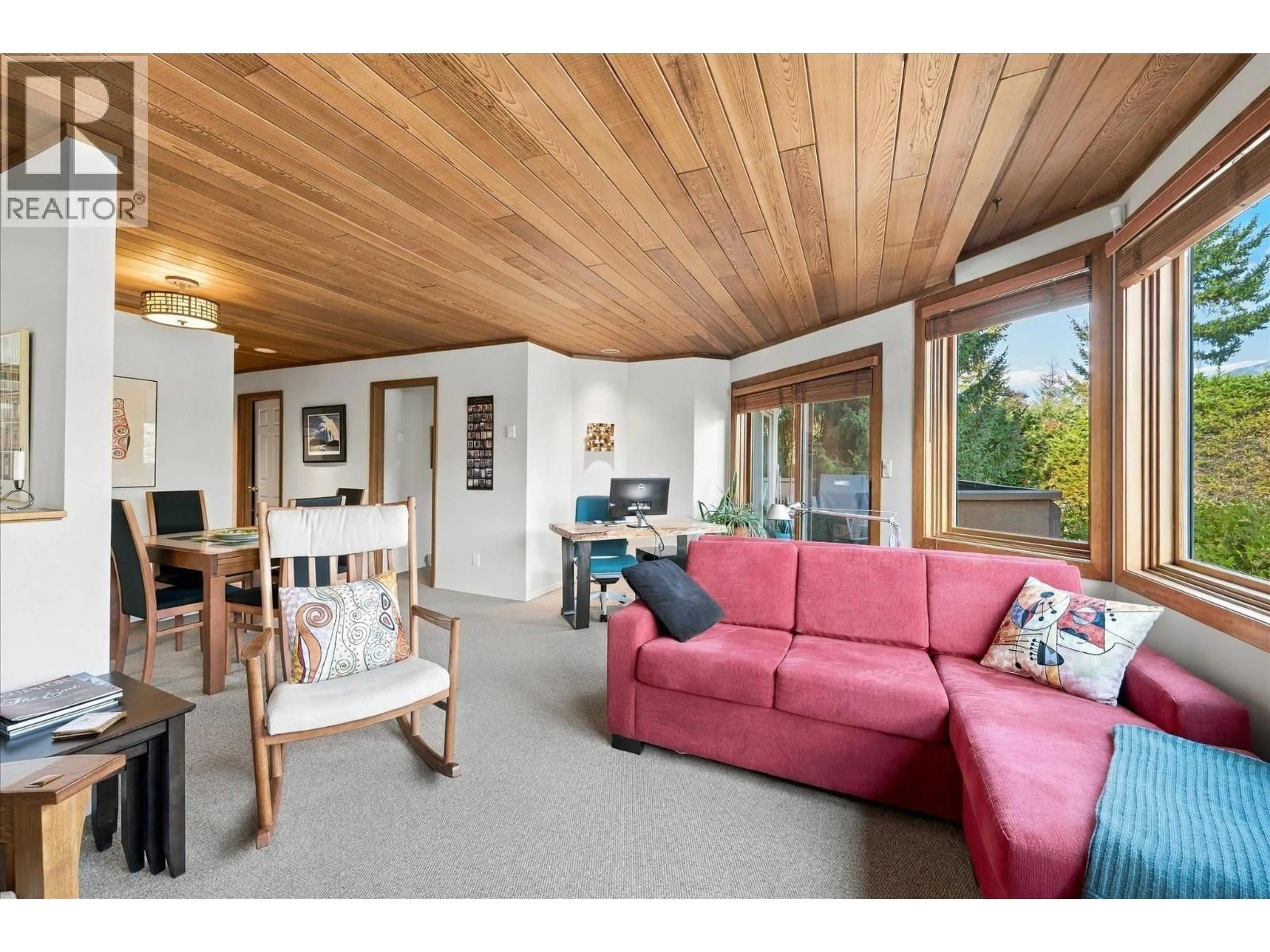 Living room with furniture, wood/laminate floor for 109 - 6117 EAGLE DRIVE, Whistler British Columbia V8E0E1