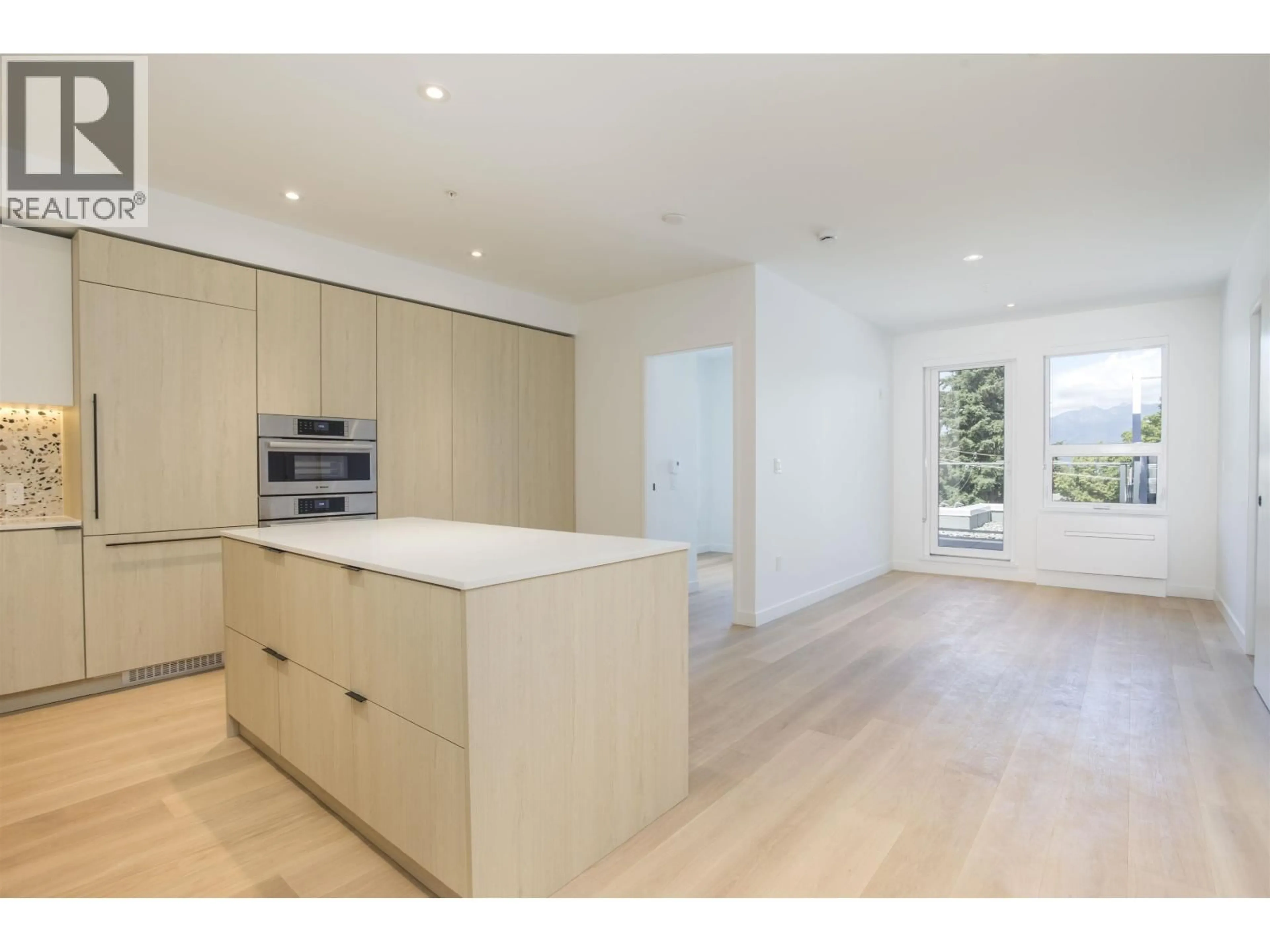 Open concept kitchen, unknown for PH517 - 2471 ST. GEORGE STREET, Vancouver British Columbia V5T1W9