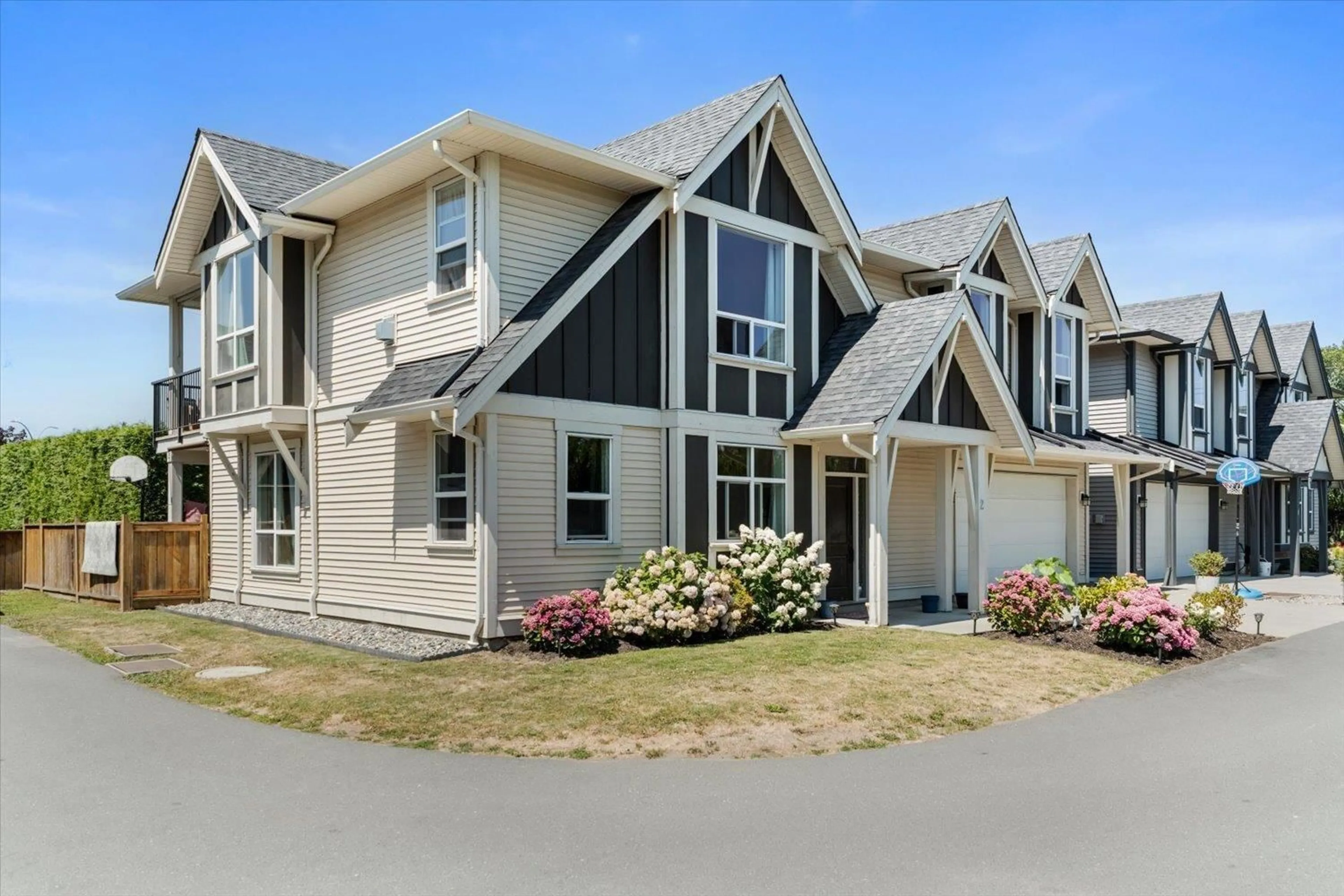 Home with vinyl exterior material, street for 2 - 45766 BRITTON AVENUE, Chilliwack British Columbia V2R1X7