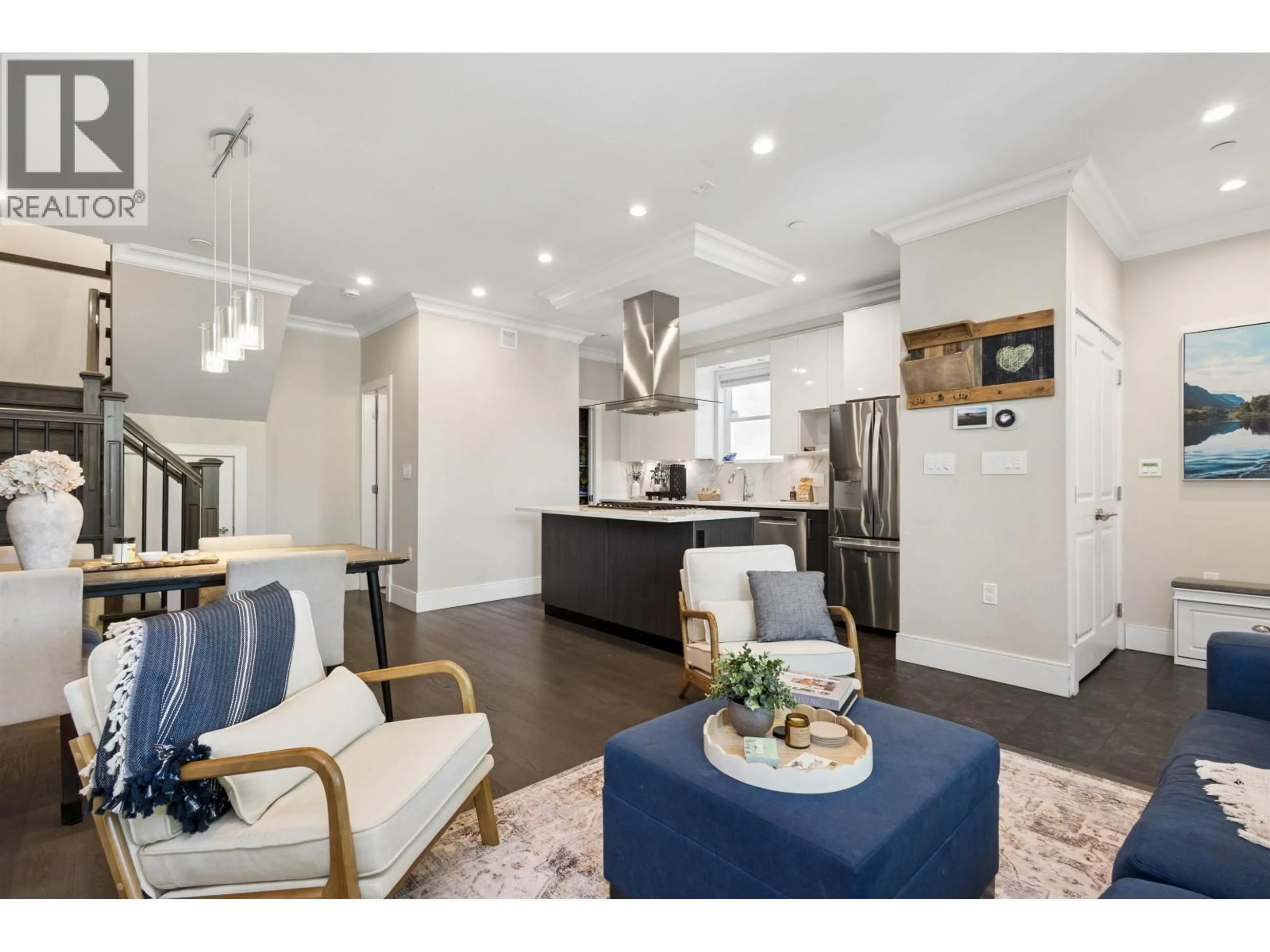 Open concept kitchen, wood/laminate floor for 1336 23 AVENUE, Vancouver British Columbia V5V1Z2