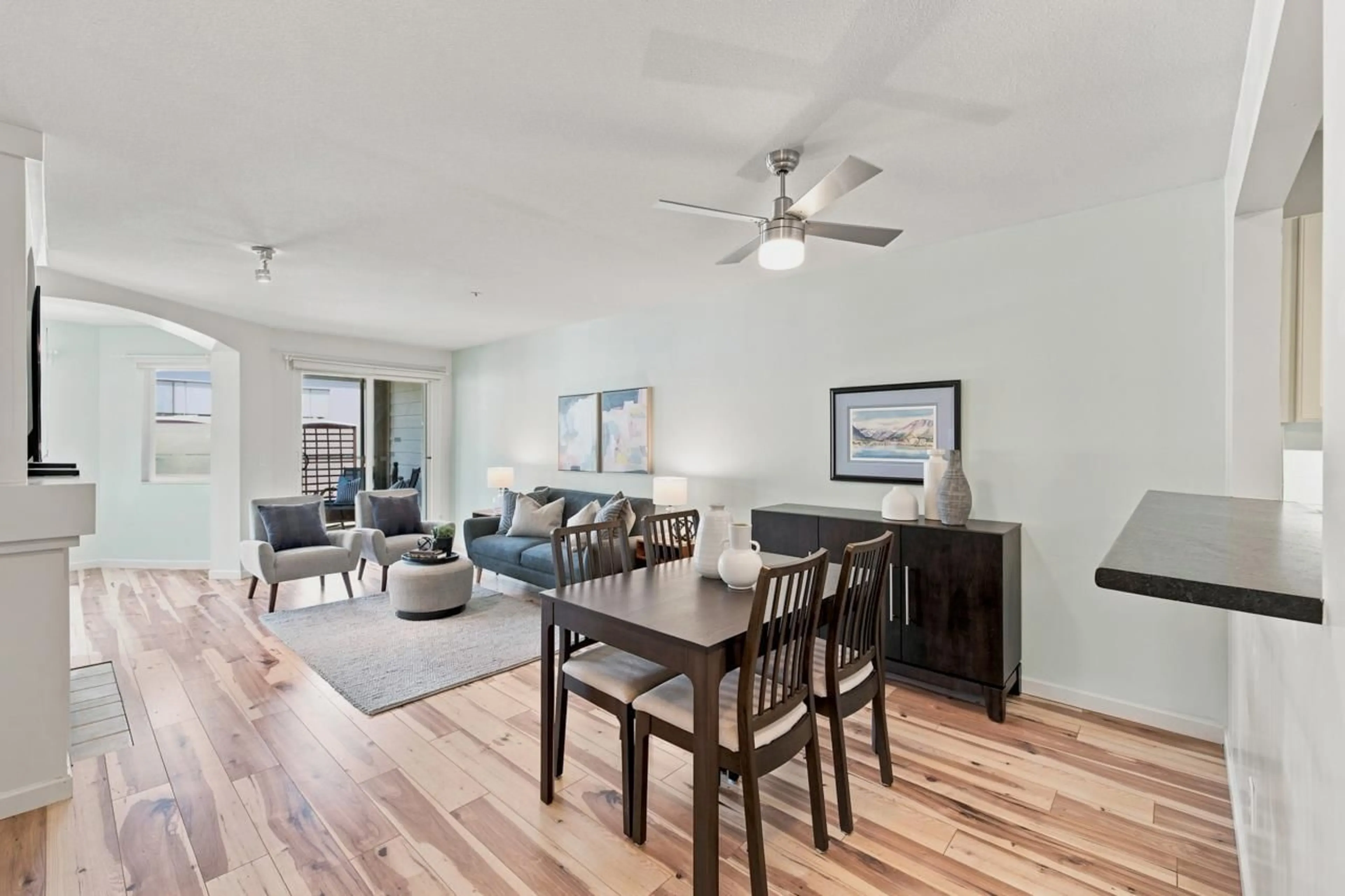 Living room with furniture, wood/laminate floor for 204 - 20125 55A AVENUE, Langley British Columbia V3A8L6