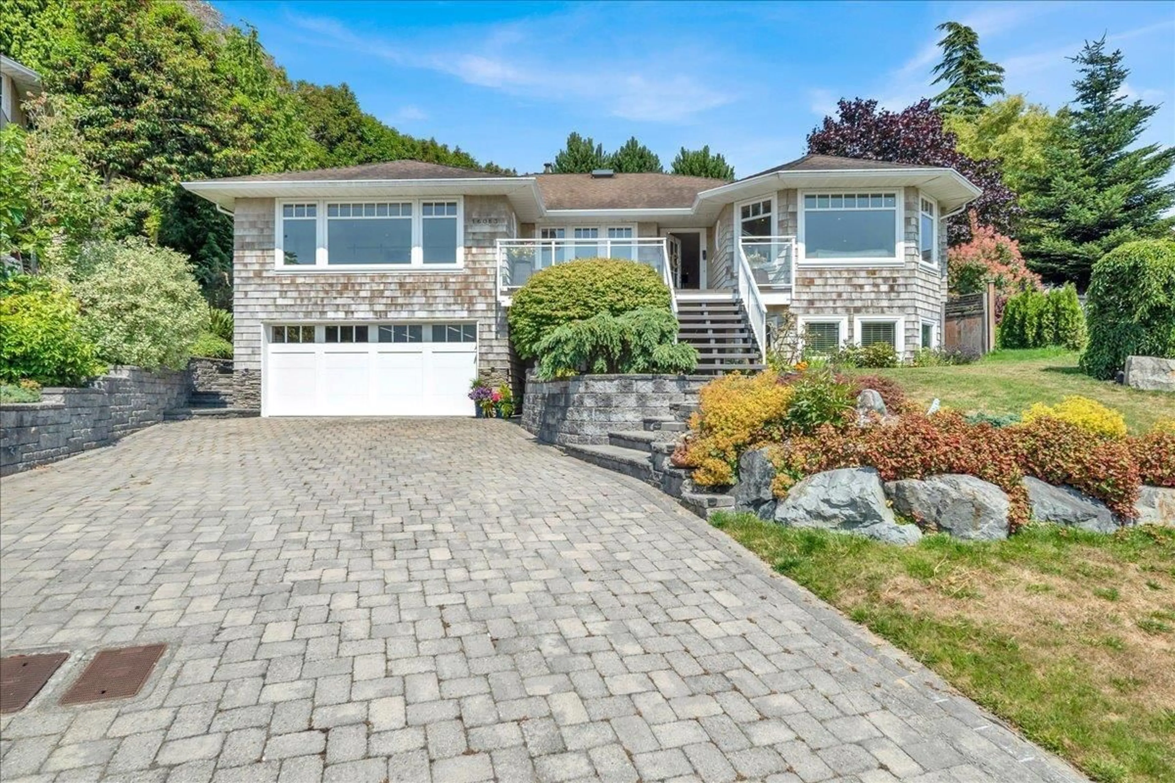 Home with vinyl exterior material, street for 16063 8 AVENUE, Surrey British Columbia V4A1A1