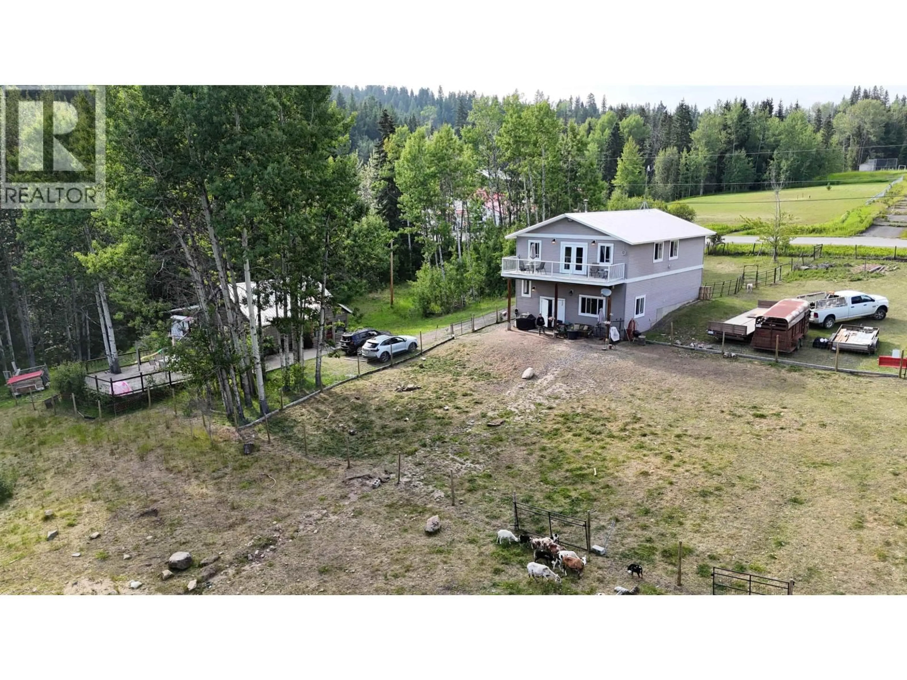 A pic from outside/outdoor area/front of a property/back of a property/a pic from drone, water/lake/river/ocean view for 7566 BRIDGE LAKE BUSINESS ROUTE, 100 Mile House British Columbia V0K1E0