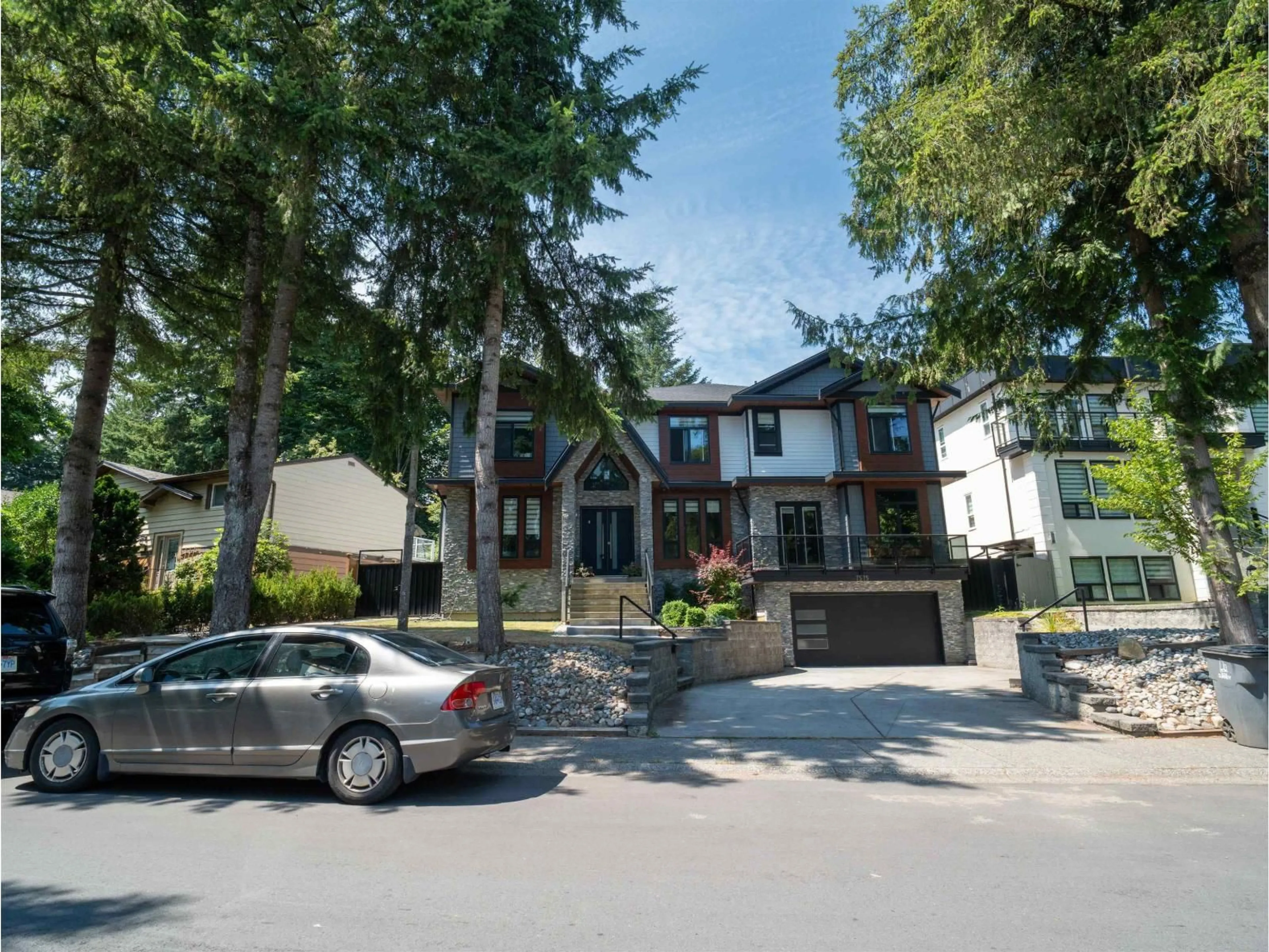 A pic from outside/outdoor area/front of a property/back of a property/a pic from drone, street for 7575 143 STREET, Surrey British Columbia V3W5P2