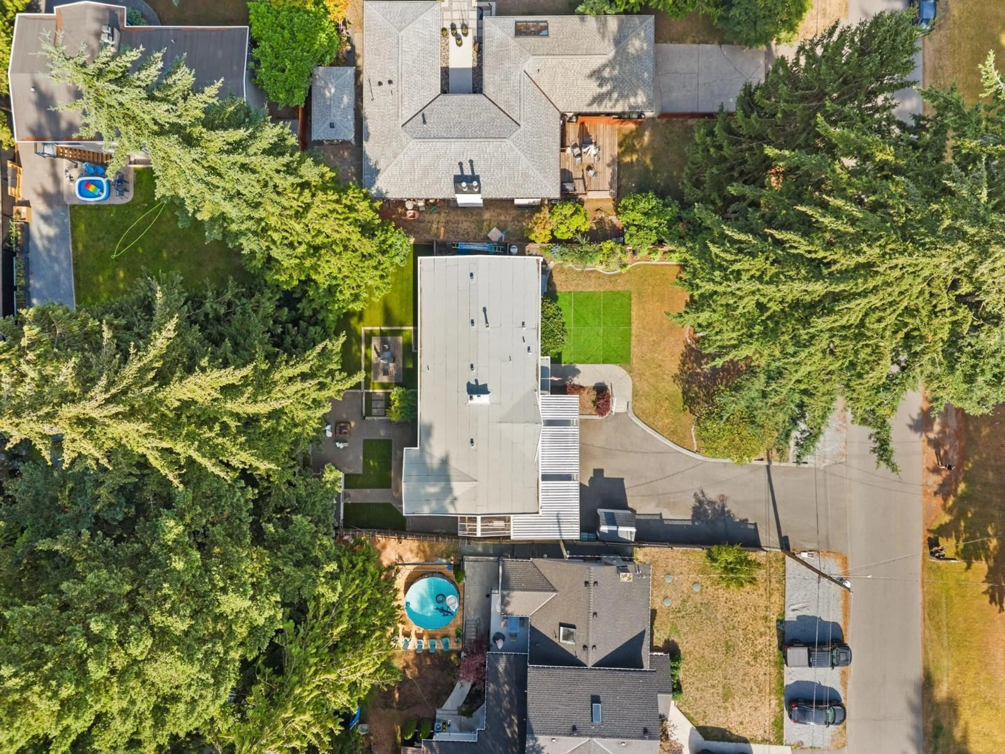 A pic from outside/outdoor area/front of a property/back of a property/a pic from drone, street for 19637 42 AVENUE, Langley British Columbia V3A3A3