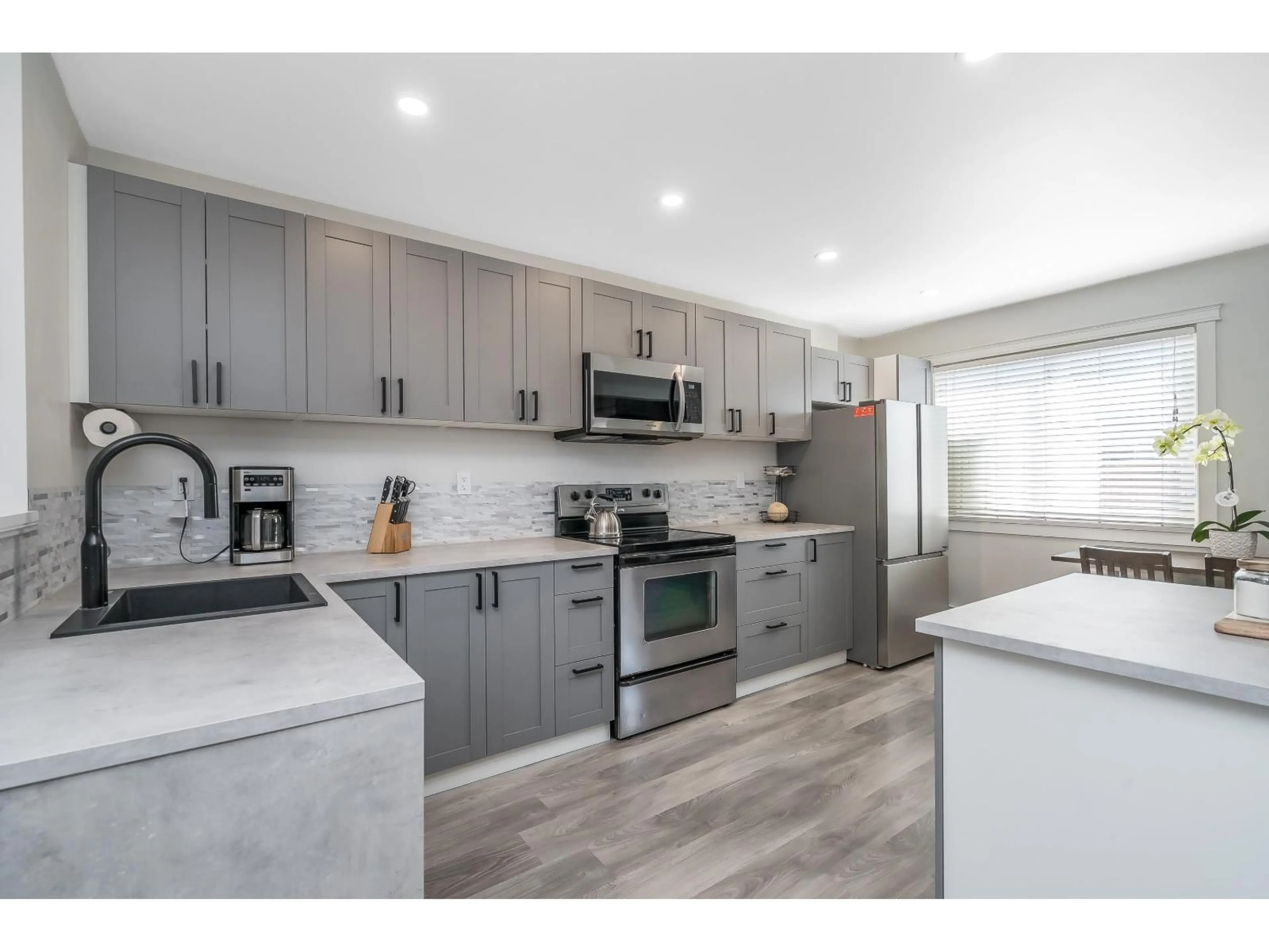 Open concept kitchen, unknown for 62 - 27456 32 AVENUE, Langley British Columbia V4W3P1