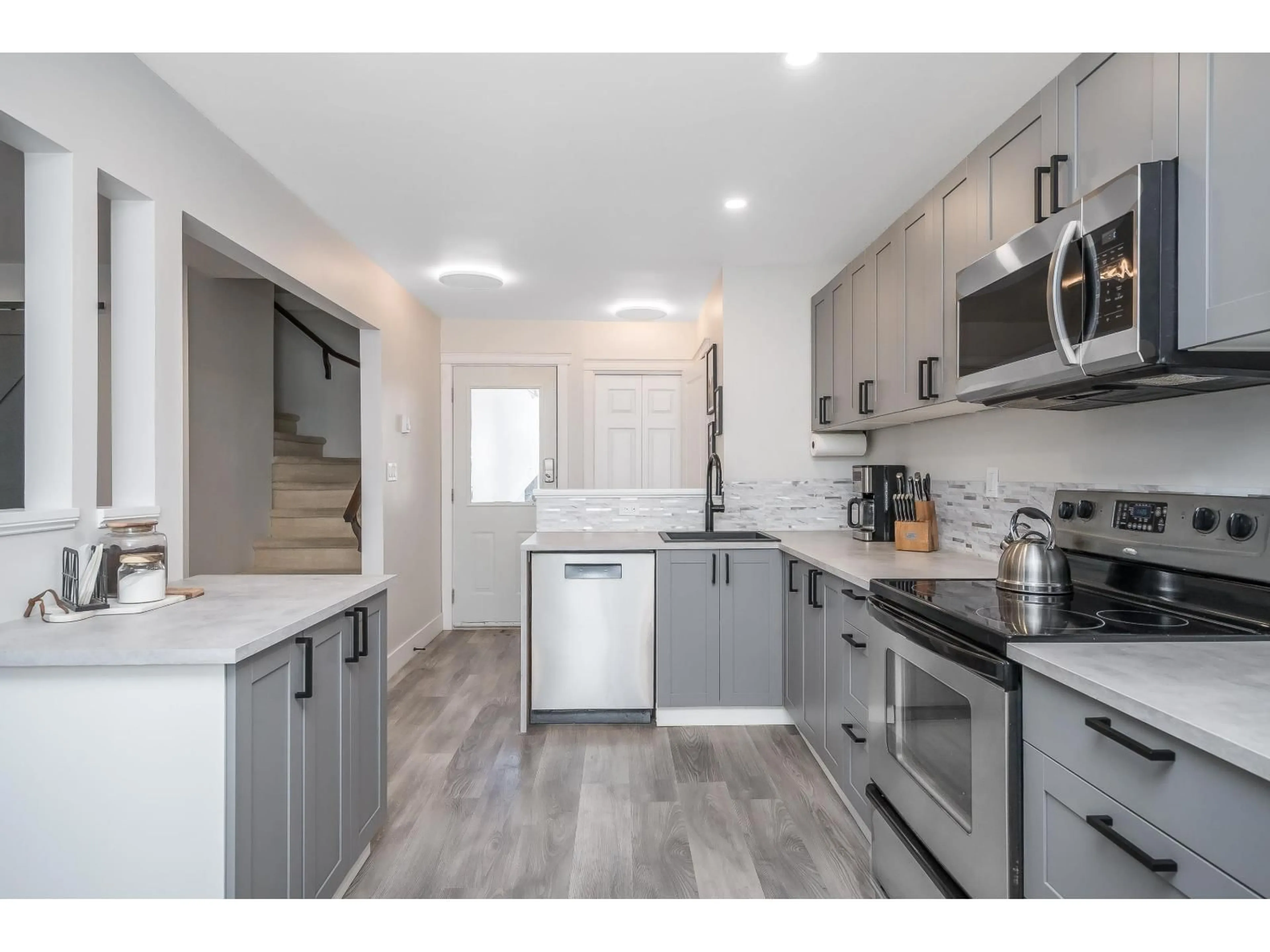 Open concept kitchen, unknown for 62 - 27456 32 AVENUE, Langley British Columbia V4W3P1