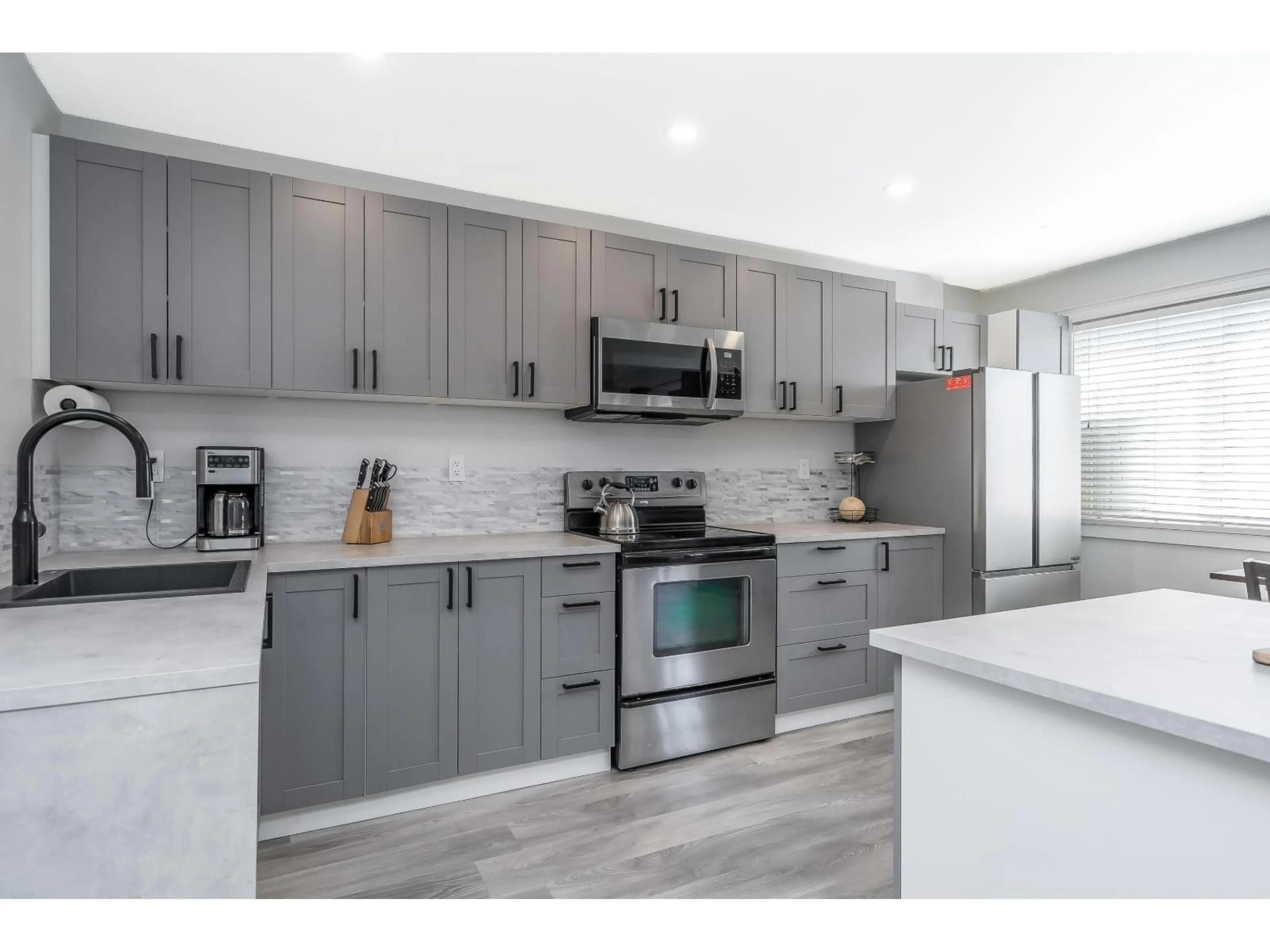 Open concept kitchen, unknown for 62 - 27456 32 AVENUE, Langley British Columbia V4W3P1