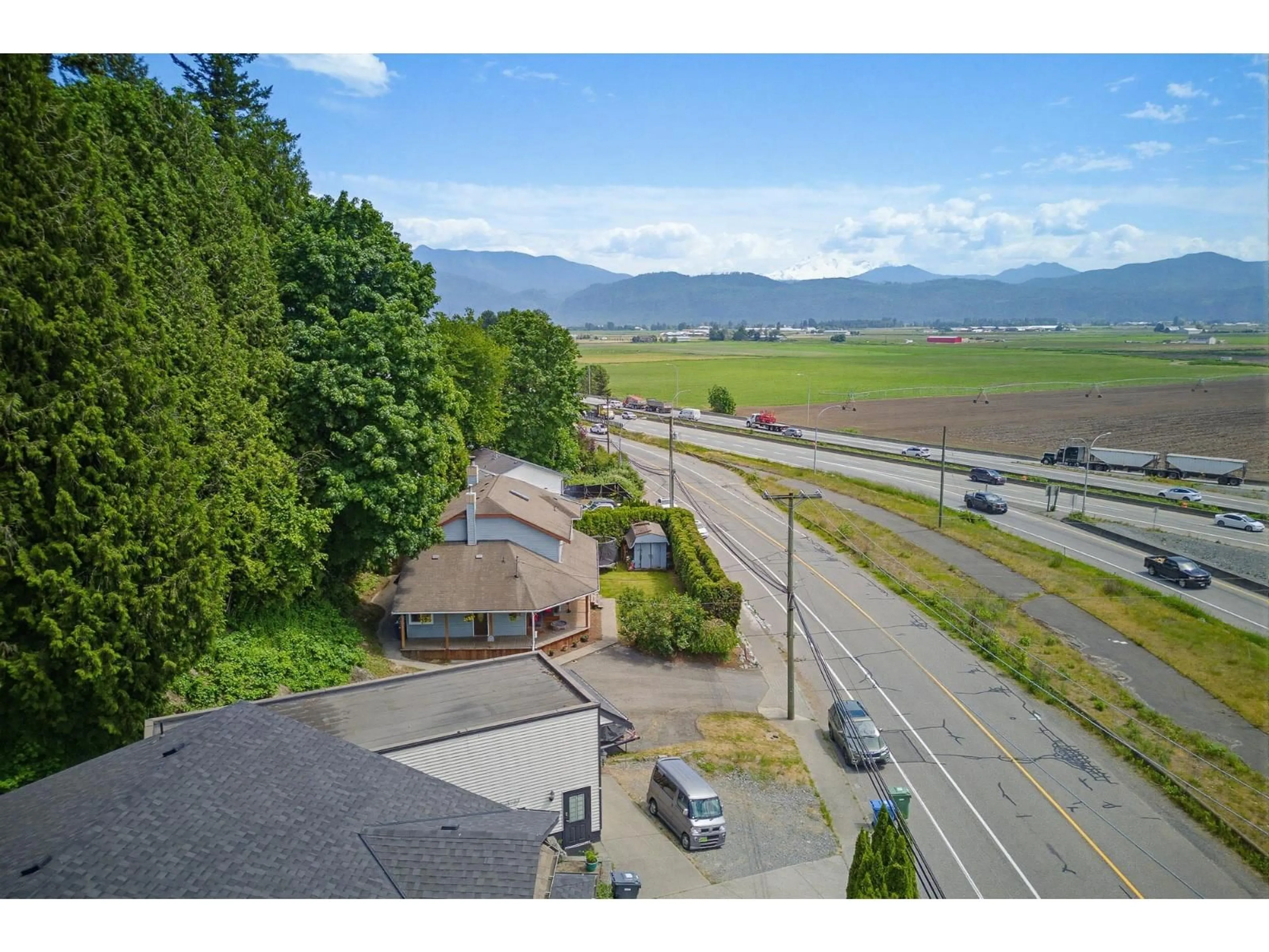 A pic from outside/outdoor area/front of a property/back of a property/a pic from drone, mountain view for 34753 DELAIR ROAD, Abbotsford British Columbia V2S2E1