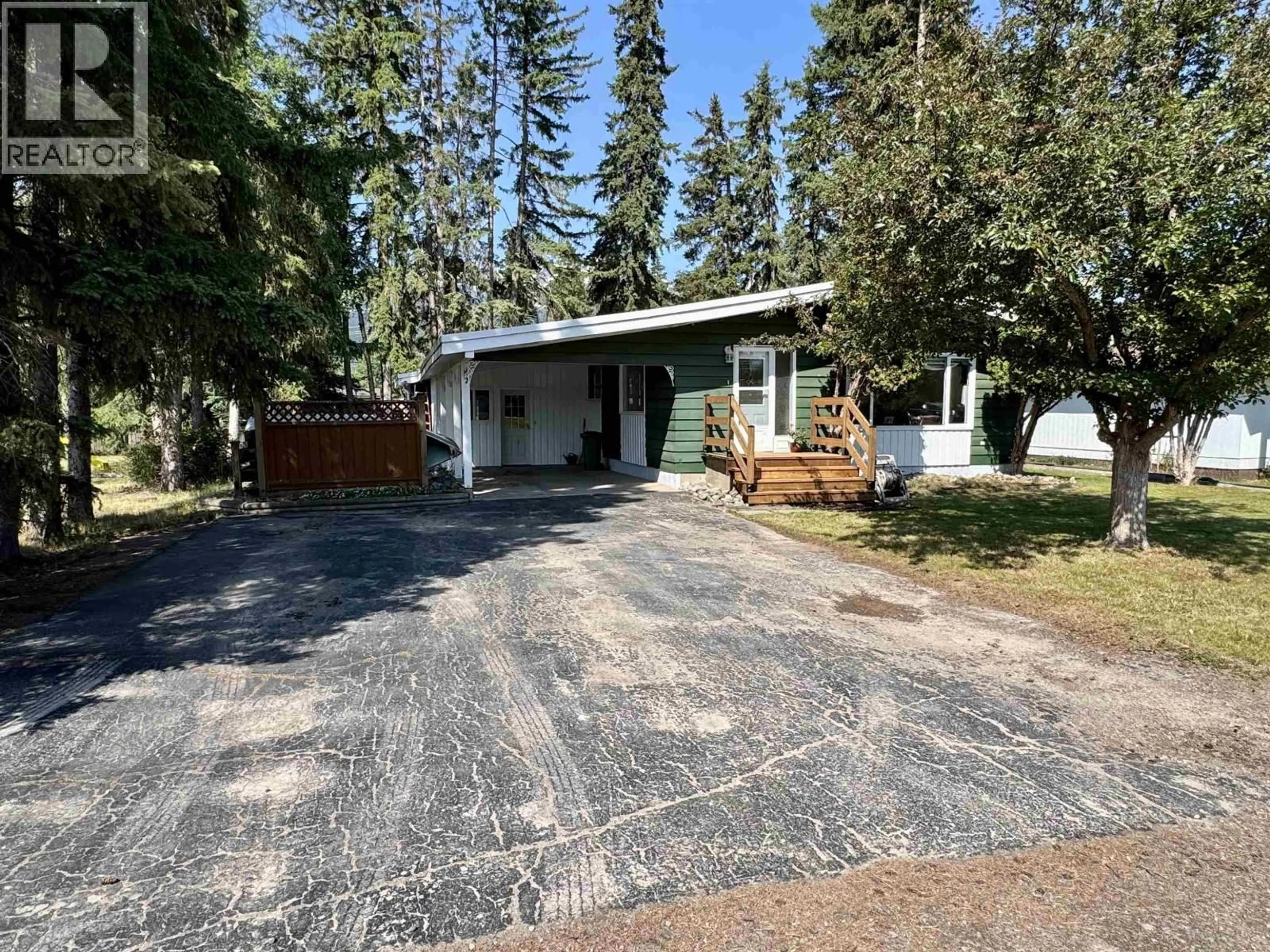 A pic from outside/outdoor area/front of a property/back of a property/a pic from drone, street for 3931 11TH AVENUE, Smithers British Columbia V0J2N0