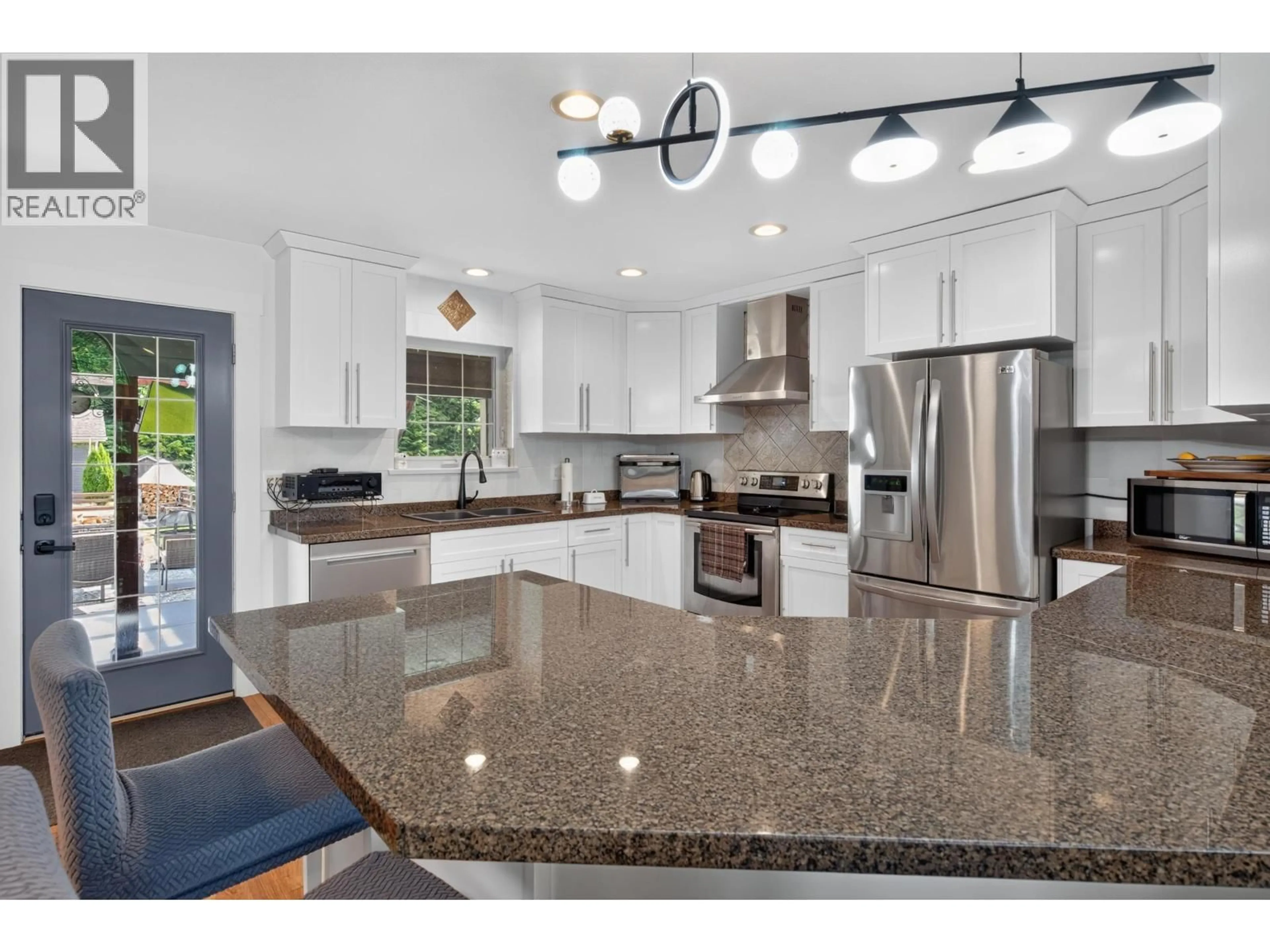 Open concept kitchen, ceramic/tile floor for 26 BLUEBERRY AVENUE, Kitimat British Columbia V8C2S7