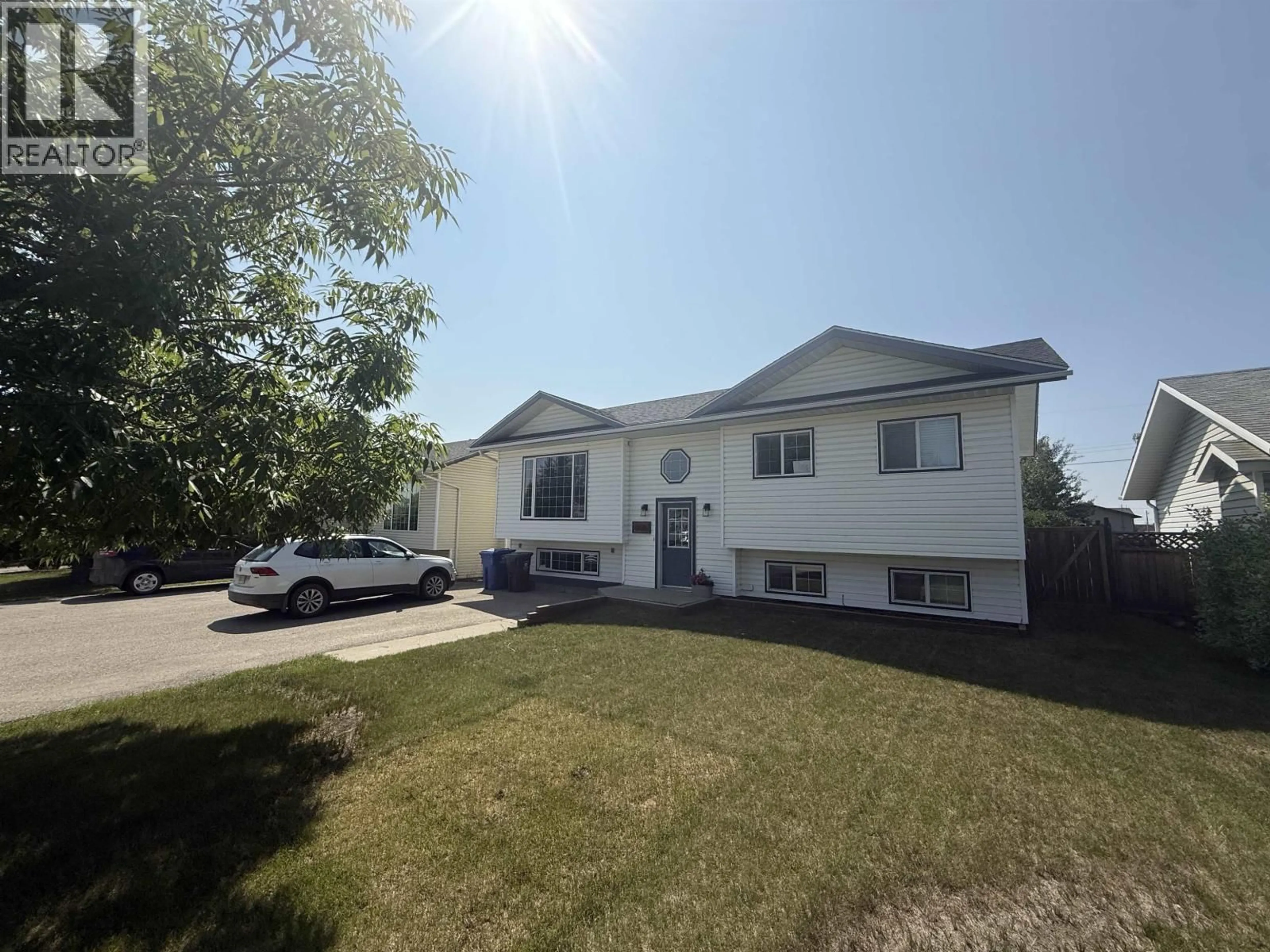 Home with vinyl exterior material, street for 8616 90 STREET, Fort St. John British Columbia V1J6S9