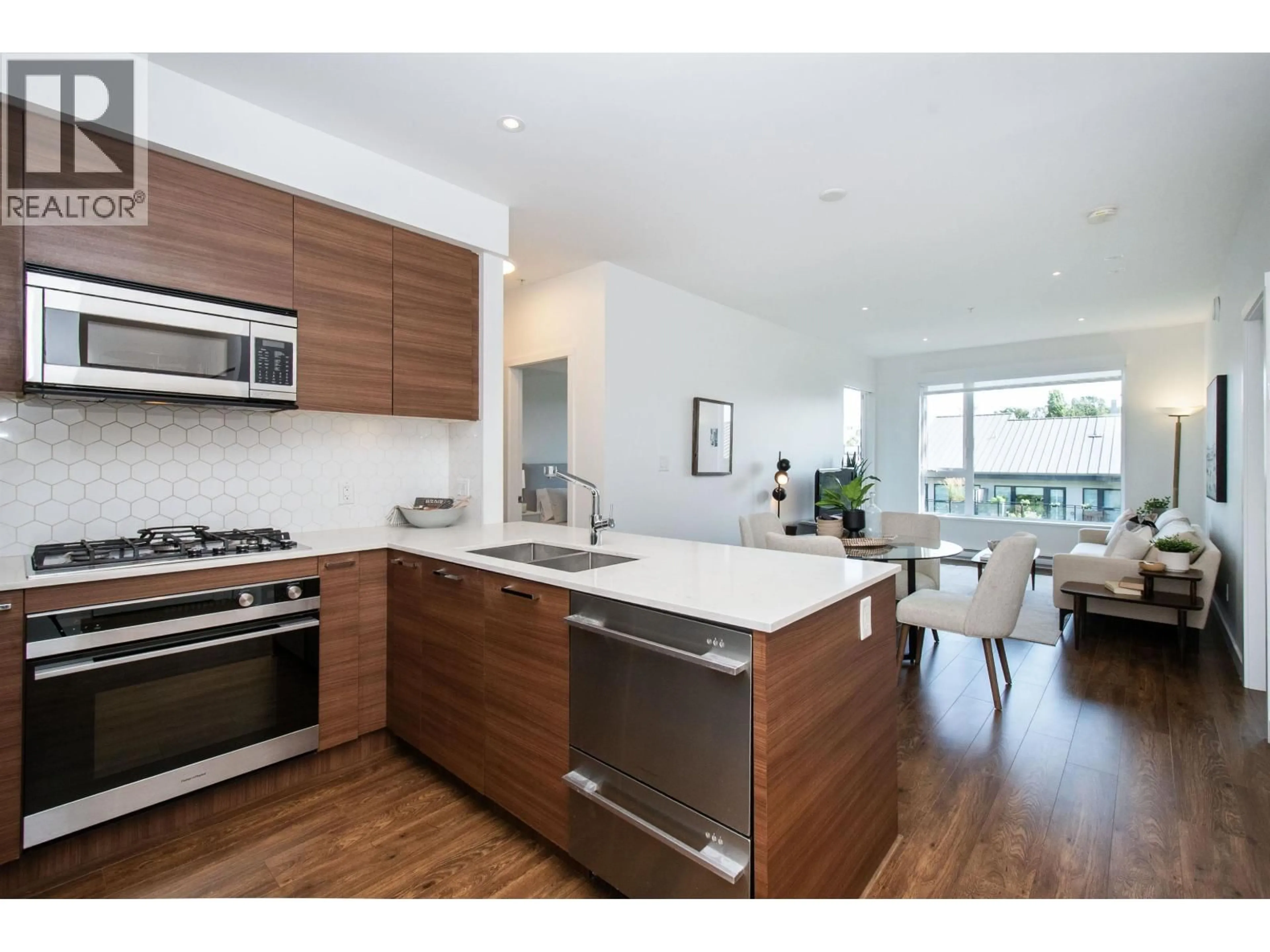 Open concept kitchen, wood/laminate floor for 402 - 1061 MARINE DRIVE, North Vancouver British Columbia V7P1S6