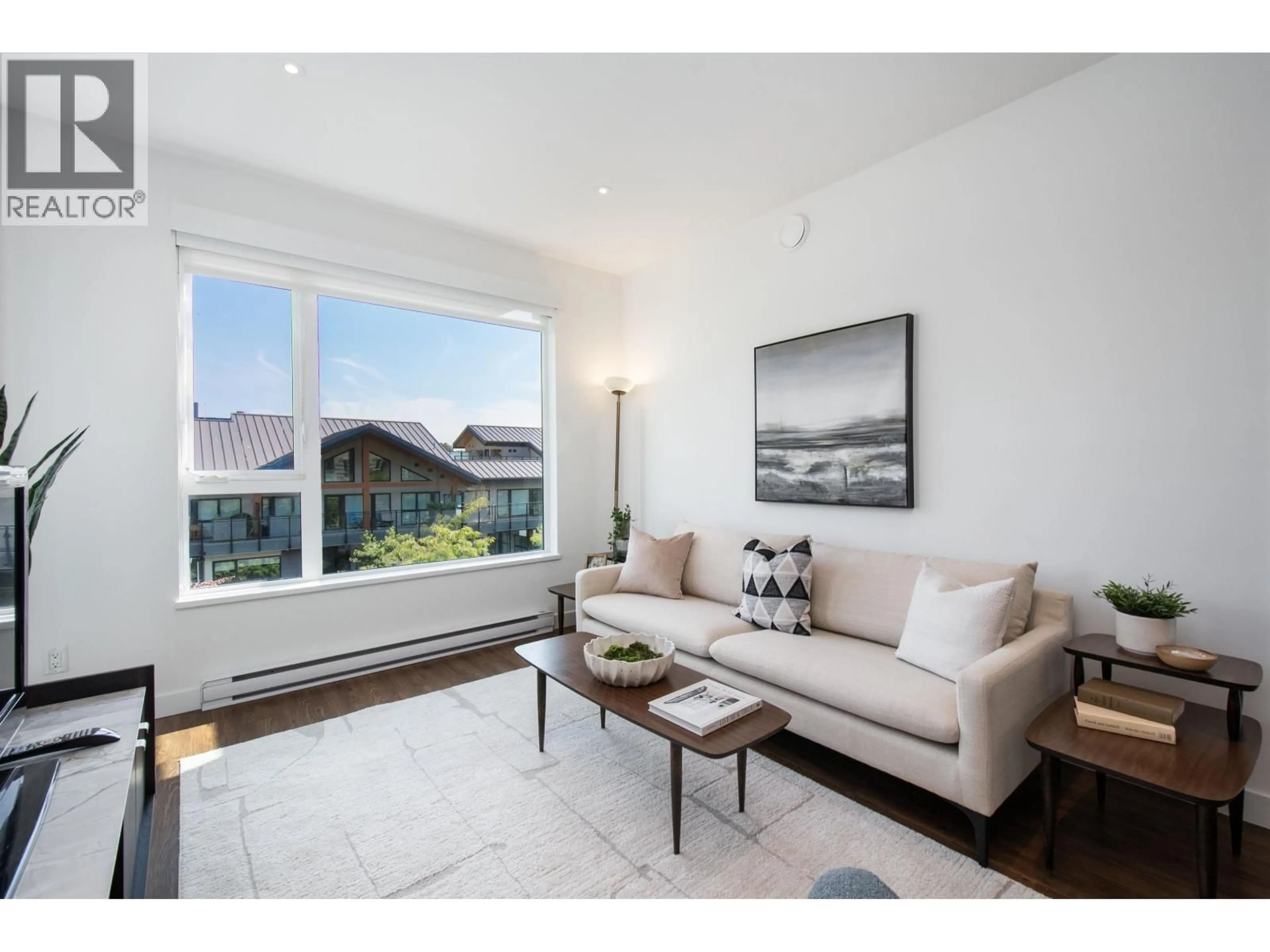 Living room with furniture, unknown for 402 - 1061 MARINE DRIVE, North Vancouver British Columbia V7P1S6