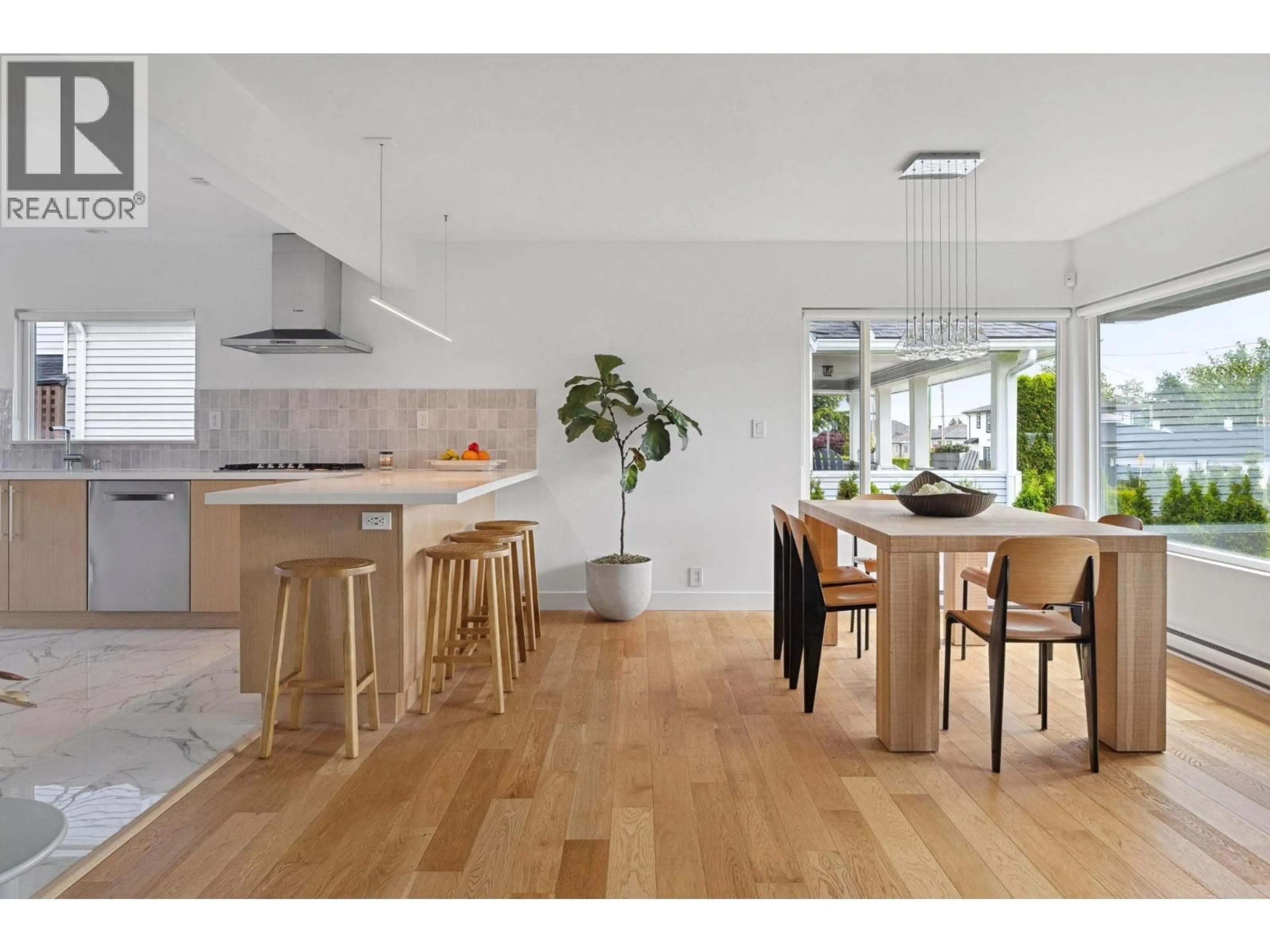 Open concept kitchen, wood/laminate floor for 8647 10TH AVENUE, Burnaby British Columbia V3N2S9