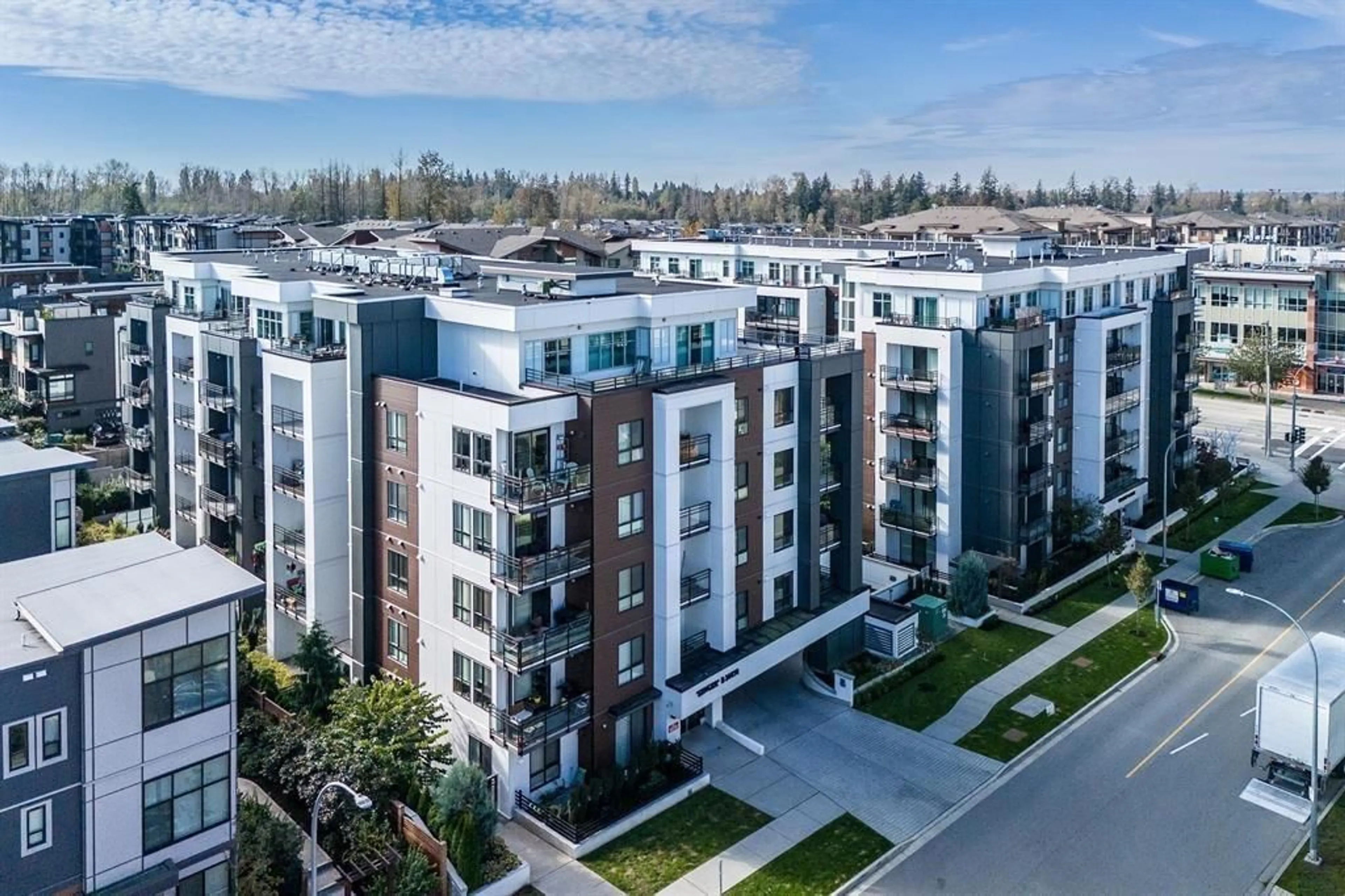 A pic from outside/outdoor area/front of a property/back of a property/a pic from drone, unknown for B302 - 20838 78B AVENUE, Langley British Columbia V2Y3M2