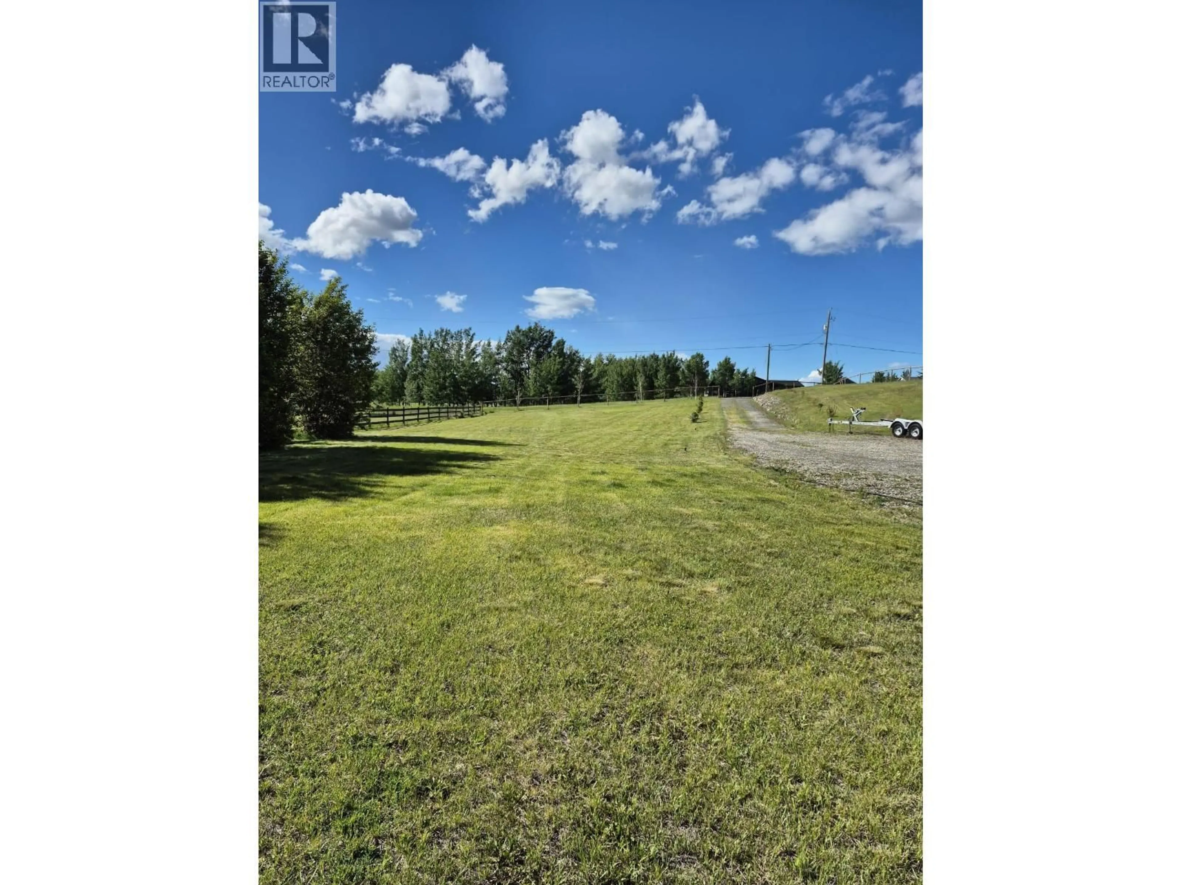 A pic from outside/outdoor area/front of a property/back of a property/a pic from drone, forest/trees view for 8569 SKYLINE DRIVE, 70 Mile House British Columbia V0K2K0