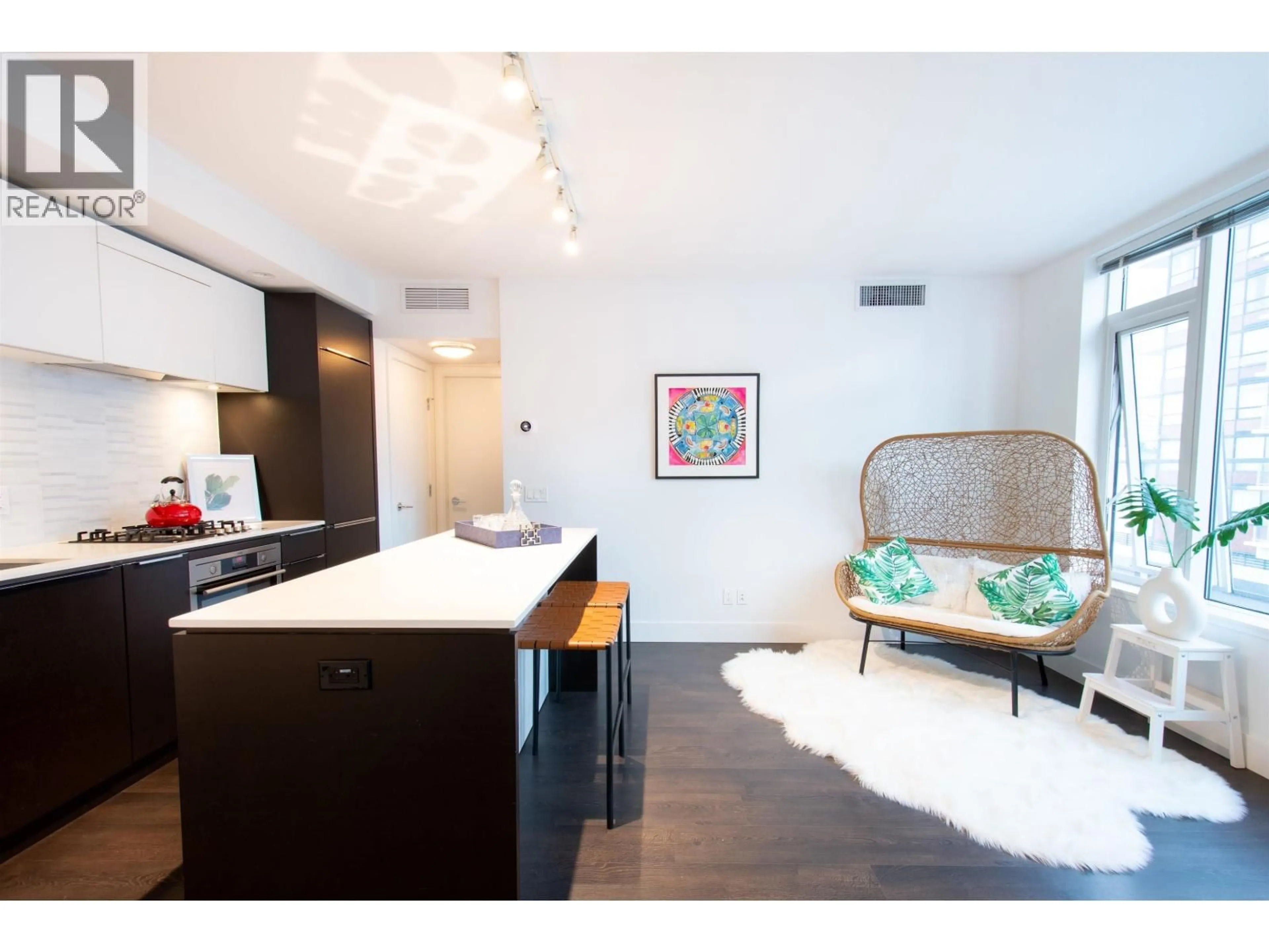 Open concept kitchen, wood/laminate floor for 622 - 5233 GILBERT ROAD, Richmond British Columbia V7C0B3