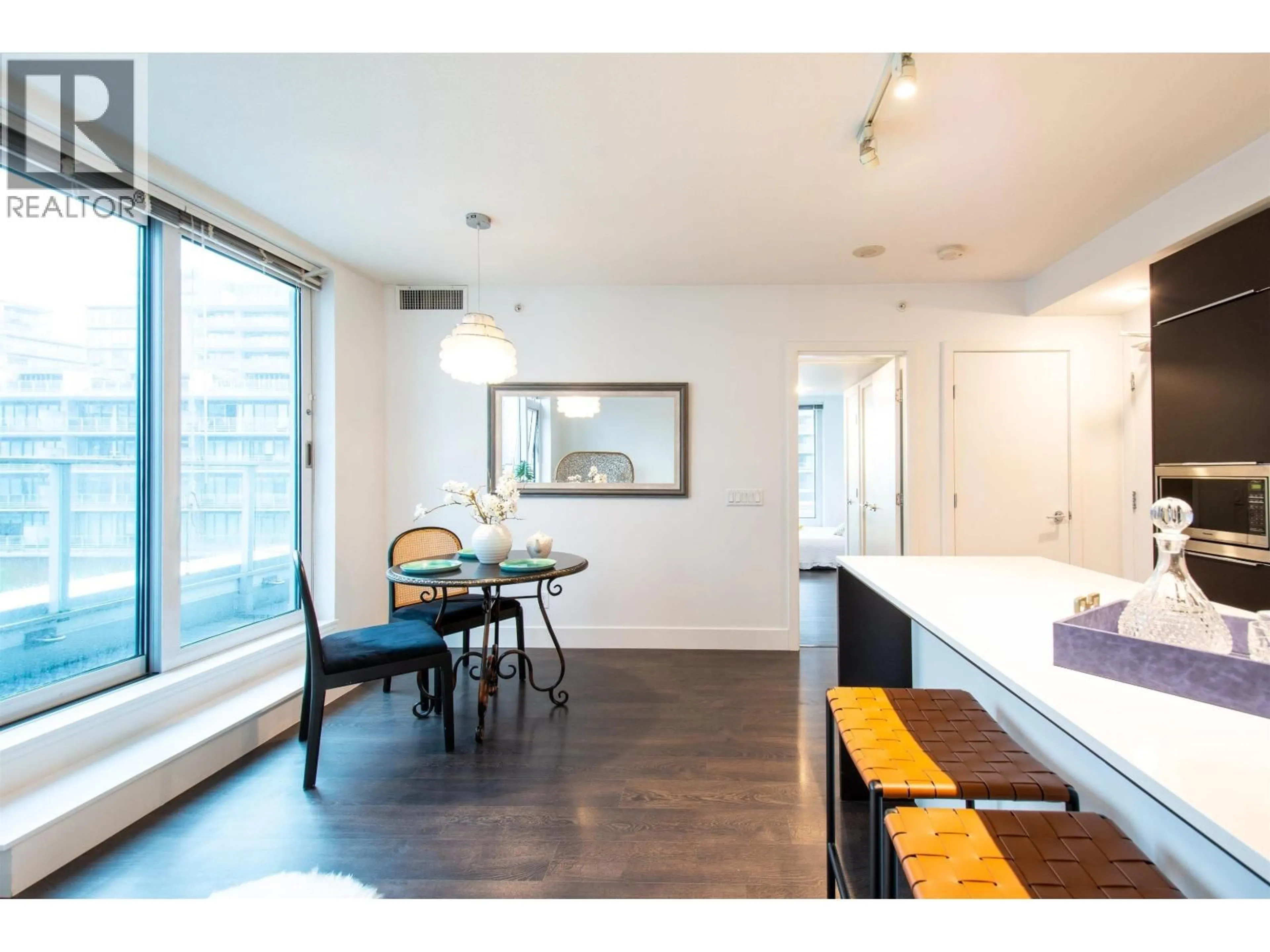 Open concept kitchen, wood/laminate floor for 622 - 5233 GILBERT ROAD, Richmond British Columbia V7C0B3